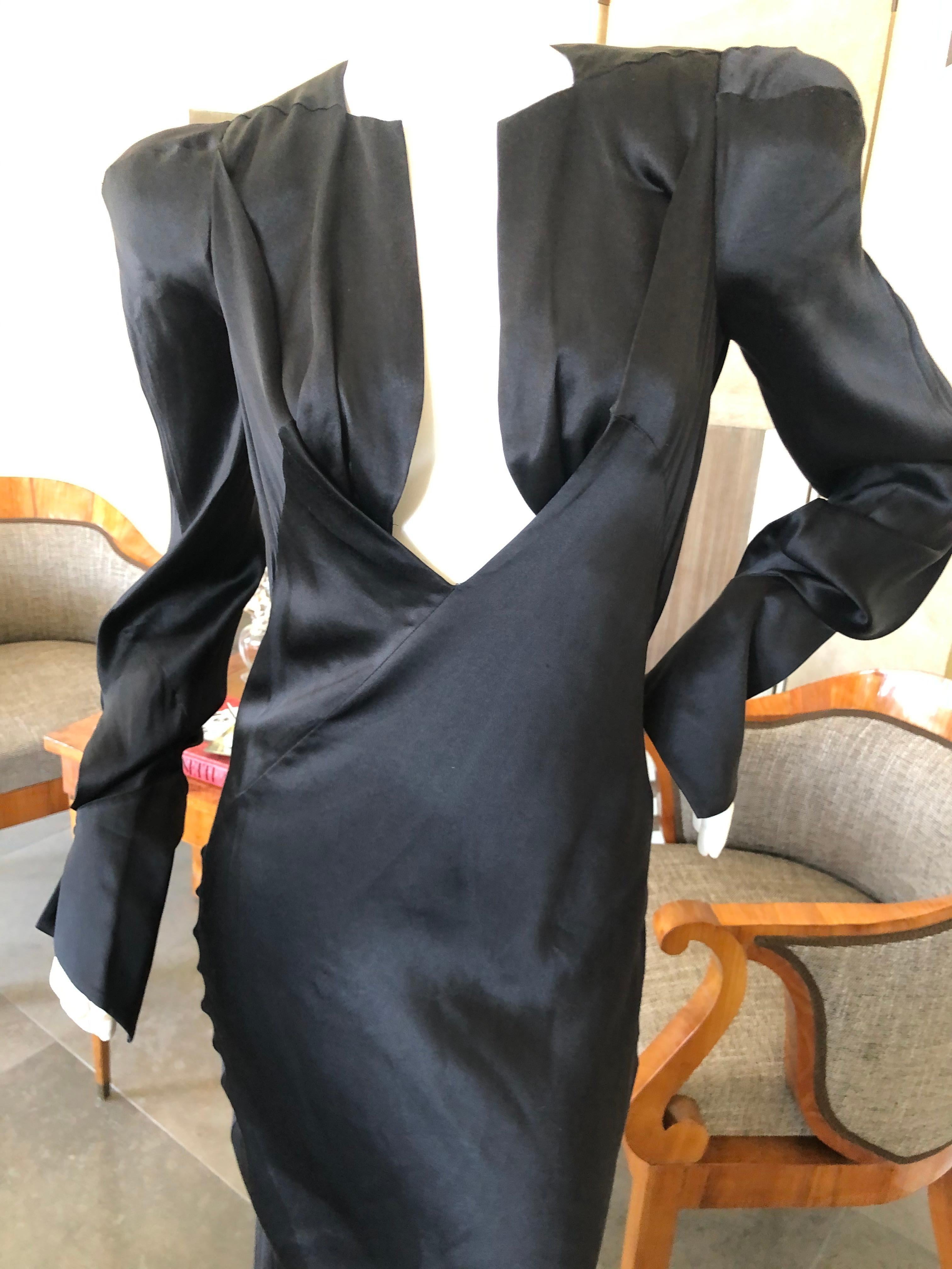 Olivier Theyskins Bias Cut Black Silk Evening Dress w Bold Shoulders and Deep Vee.
Sold at Bergdorf Goodman 2019
 Size 40 
 Bust 36