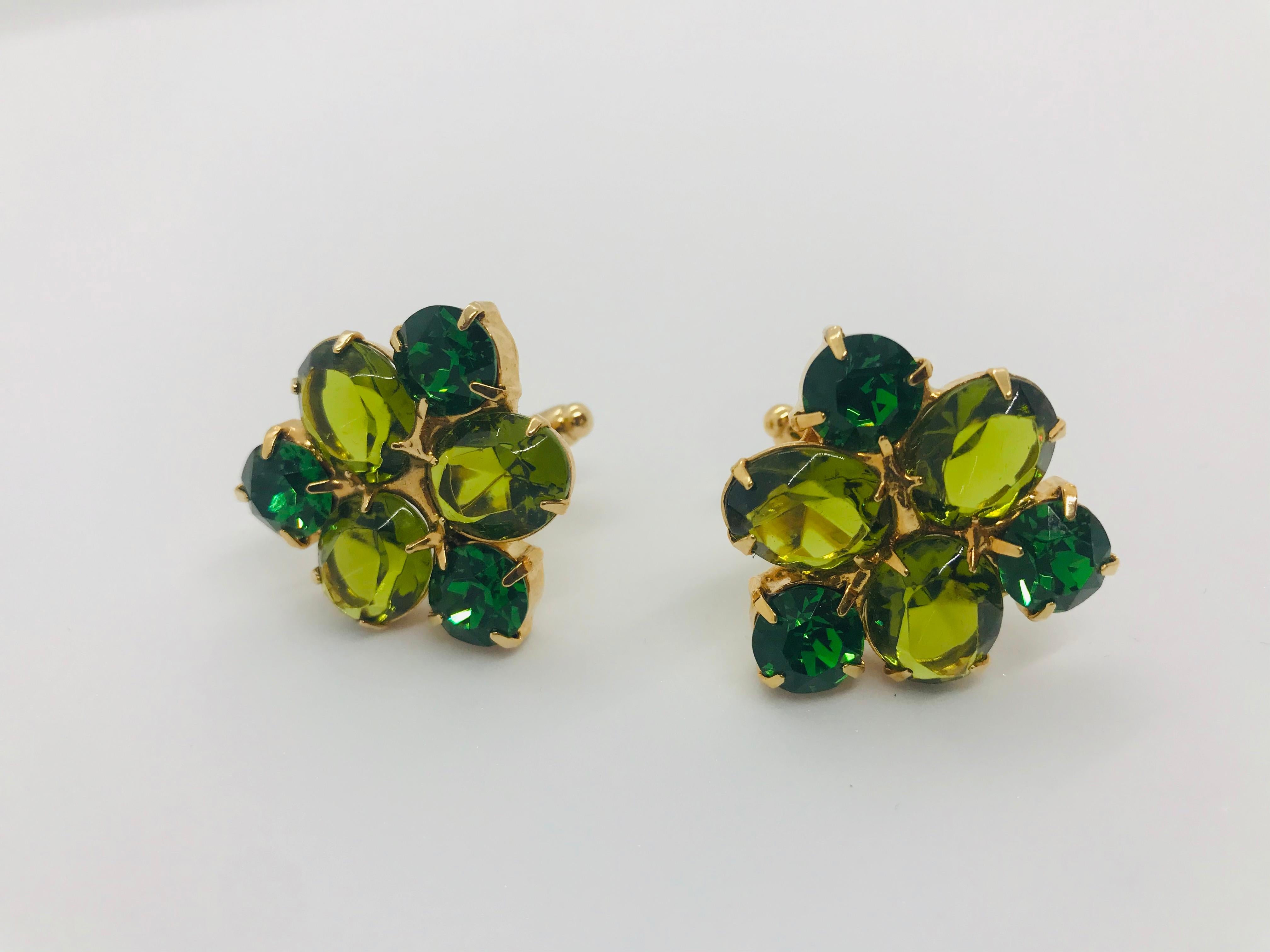 Green as the Emerald Isle is the best way to describe these olivine Austrian crystal cuff links! These  cufflinks feature vintage 1950s unfoiled Austrian crystal Olivine stones, accented with dark moss foiled Swarovski crystals. They are plated in
