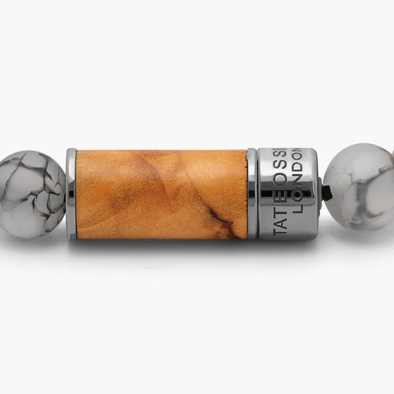 Olivo Bracelet in Olive Wood with Frosted Fire Agate, Size S

Natural olive wood contrasts seamlessly with the frosted finish of each fire agate bead. Finished in a black rhodium plated sterling silver pop clasp, meticulously engineered in our