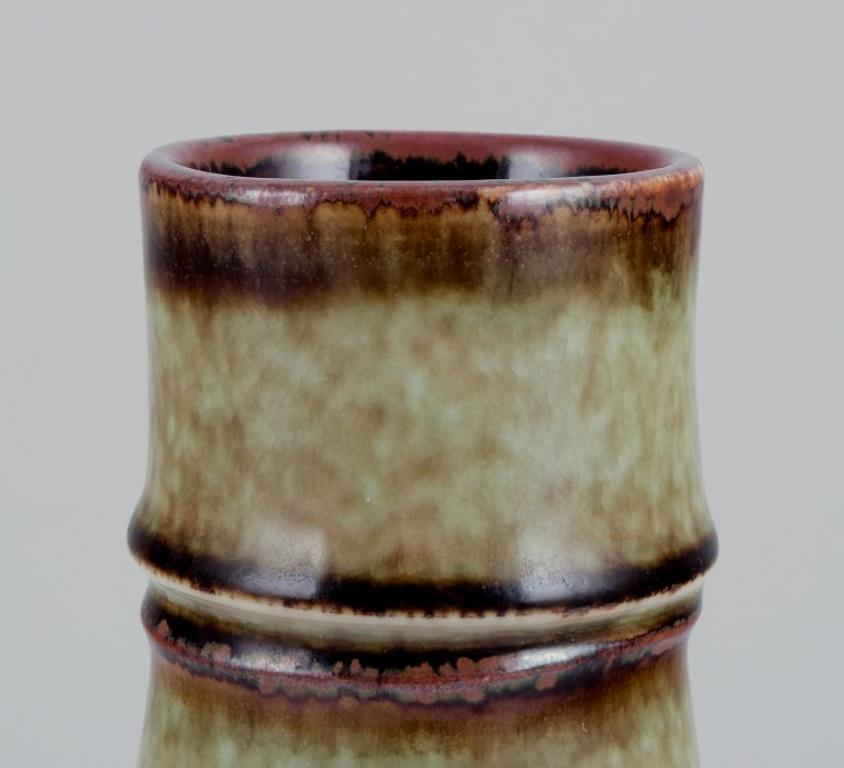Swedish Olle Alberius for Rörstrand. Large ceramic vase in brown and green shades For Sale