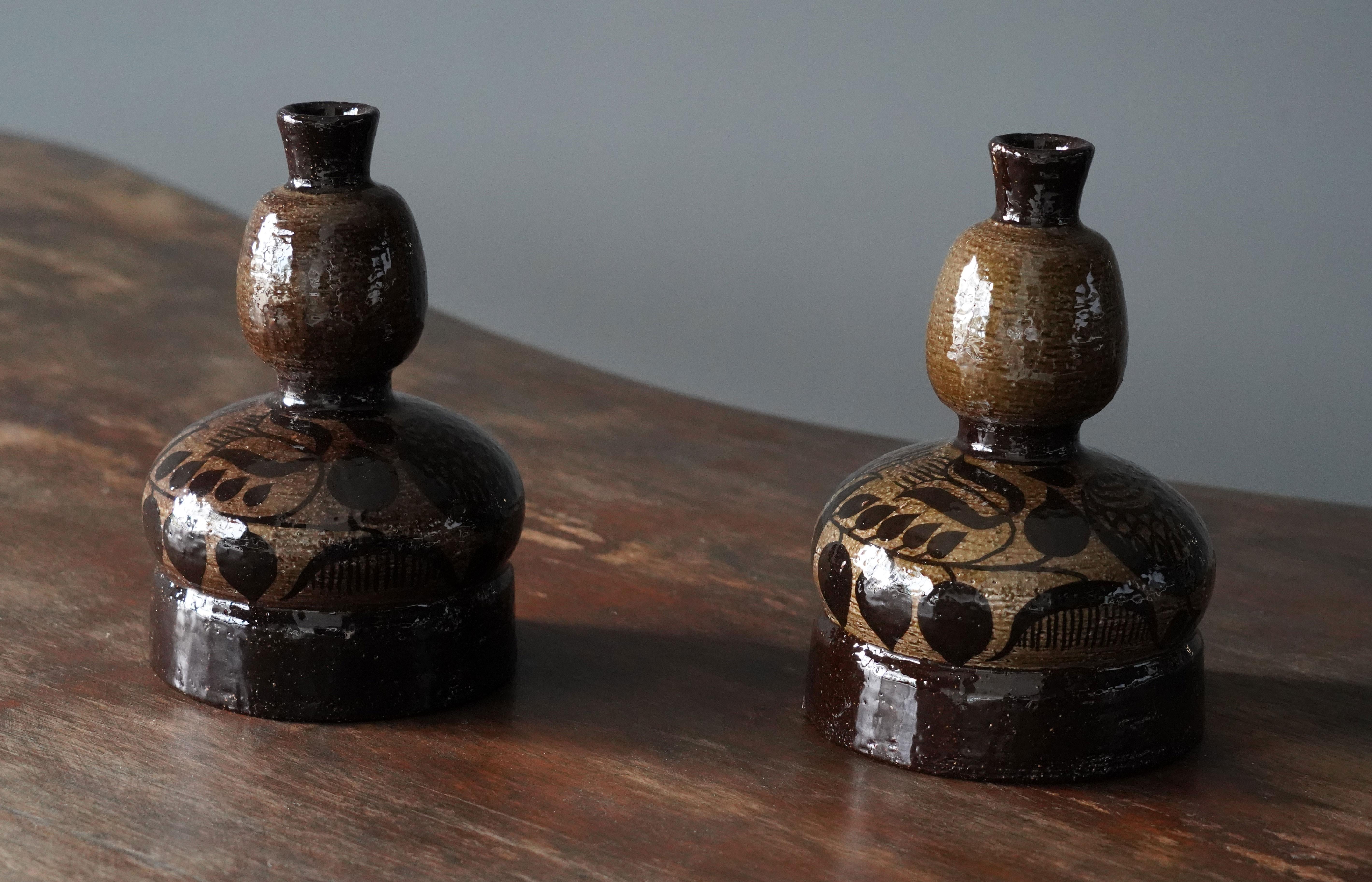 A pair of rare stoneware vases or vessels designed by Olle Alberius produced by Rörstrand, signed, circa 1950s.

From production series at Rörstands named 