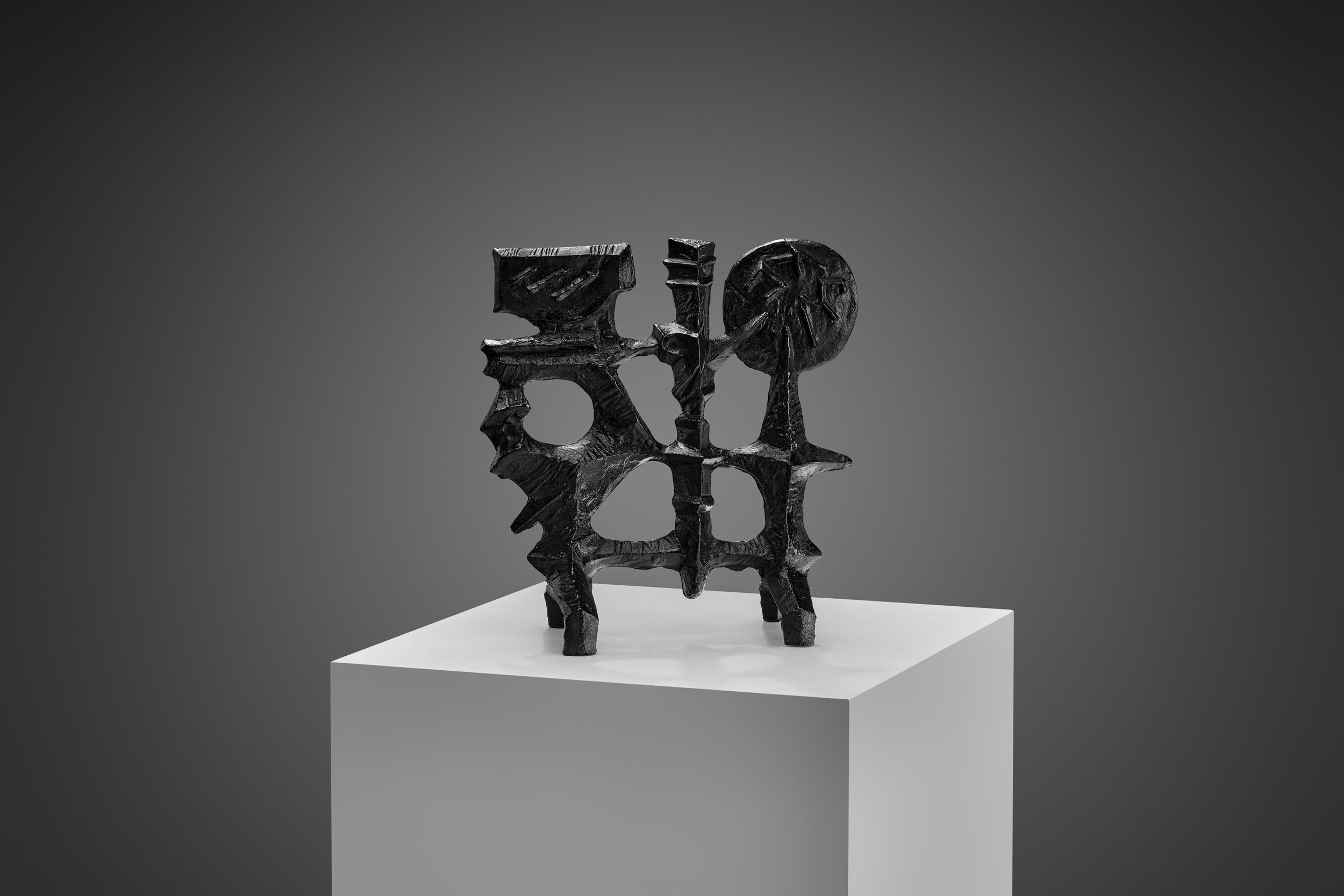 Swedish sculptor, Olle Hermansson is primarily known for his cast iron sculptures and fire screens in his signature Brutalist style. The characters and shapes appearing in his works are often inspired by Nordic mythology.

In this piece, Hermansson