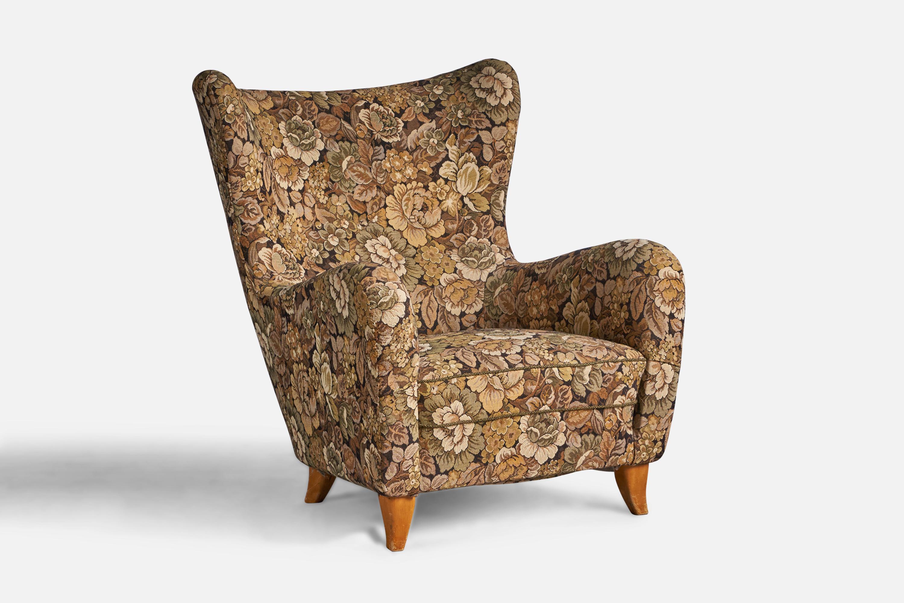 A floral-printed fabric and wood lounge chair, designed by Olle Sjögren and produced by O.H. Sjögren, Sweden, 1940s.

15” seat height