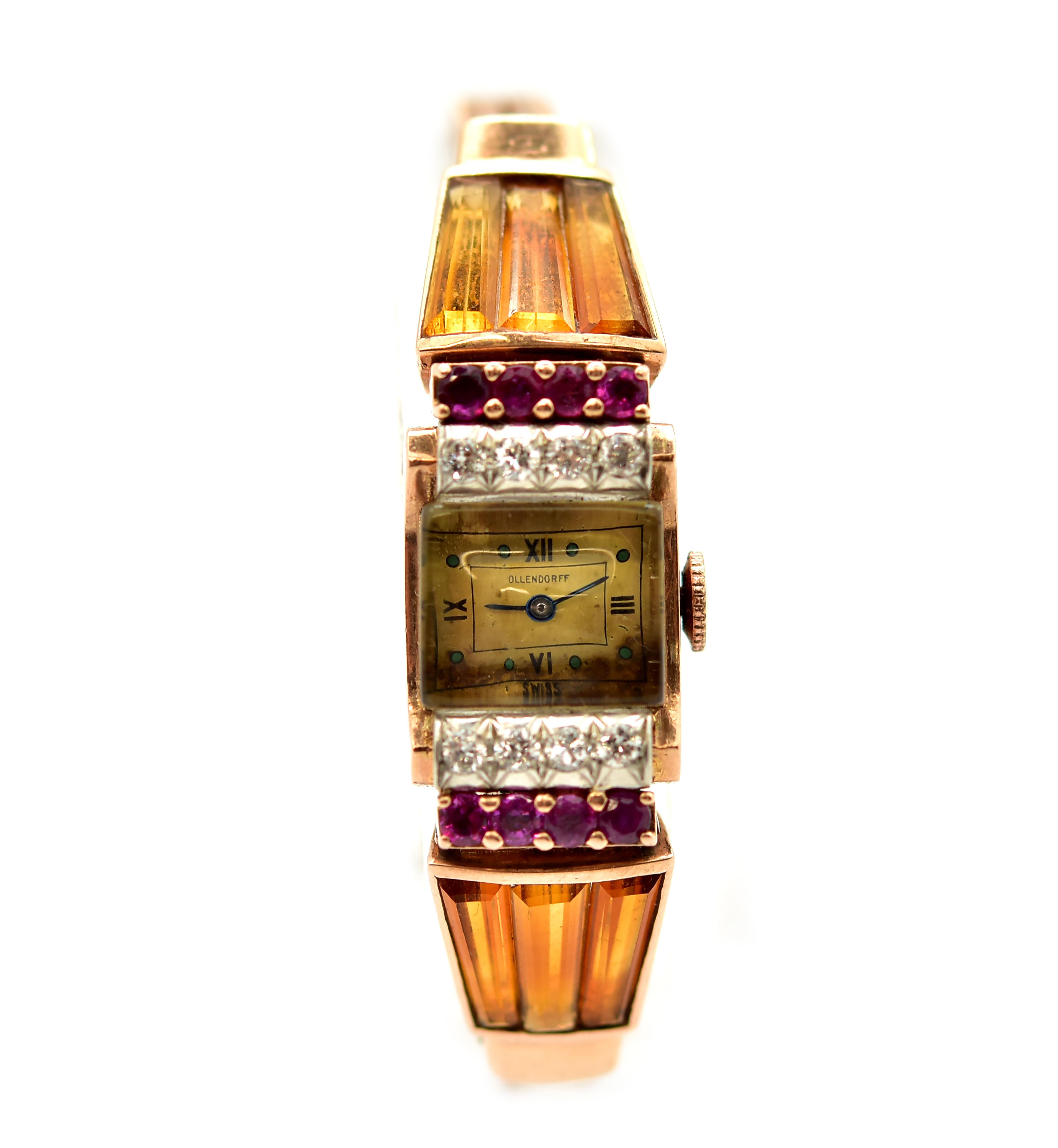 Movement: mechanical
Function: hours, minutes
Case: 14mm rose gold case with diamond and ruby bezel, baguette shaped citrine connecting band and case, protective crystal
Band: double rose gold stretch band with opening clasp
Dial: champagne colored
