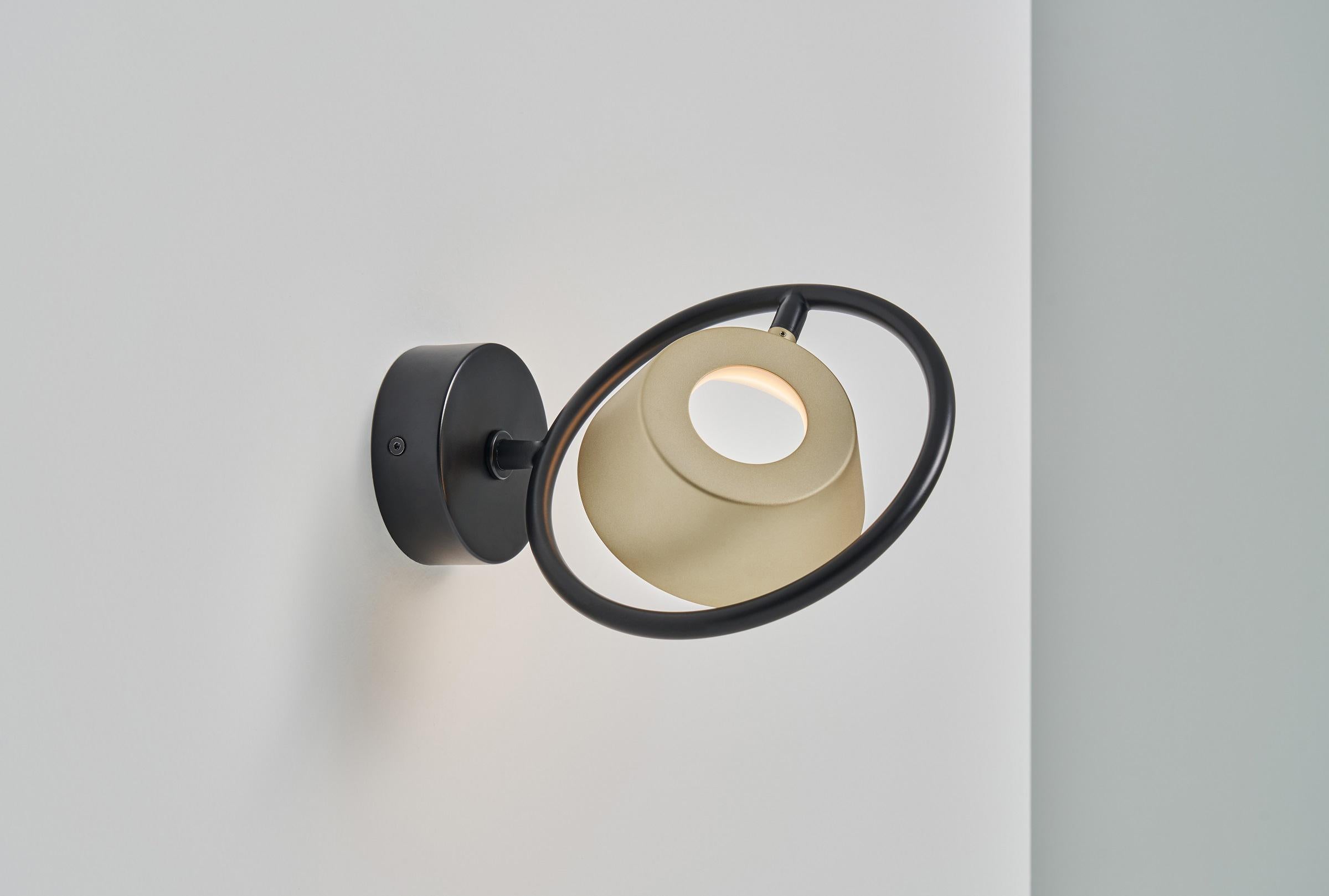 The OLO Ring collection seamlessly combines the basic elements of circle and line. The dimmable OLO Ring Wall/Ceiling lamp can comprehensively cover all angles with its omnidirectional adjustability, which can be tilted vertically as well as