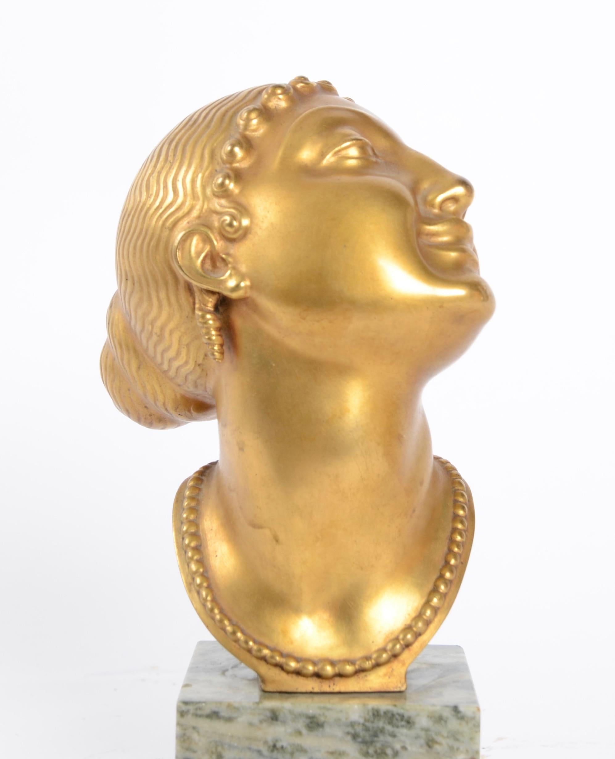 Sculpture in gilded bronze with stone base by Olof Ahlberg (1876-1956), cast by Herman Bergman. Signed and dated 1920.