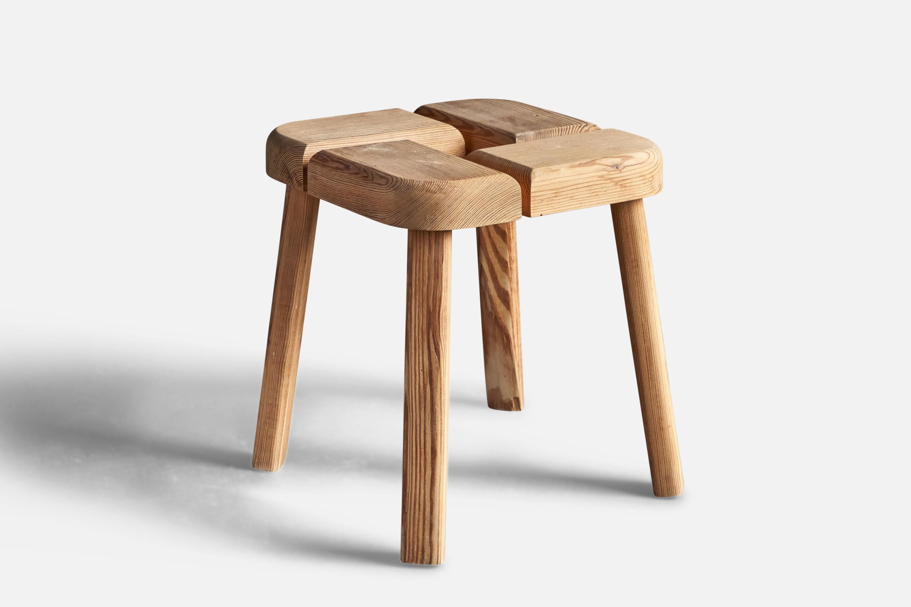 A solid pine stool, design and production attributed to Olof Ottelin, Finland, 1970s.