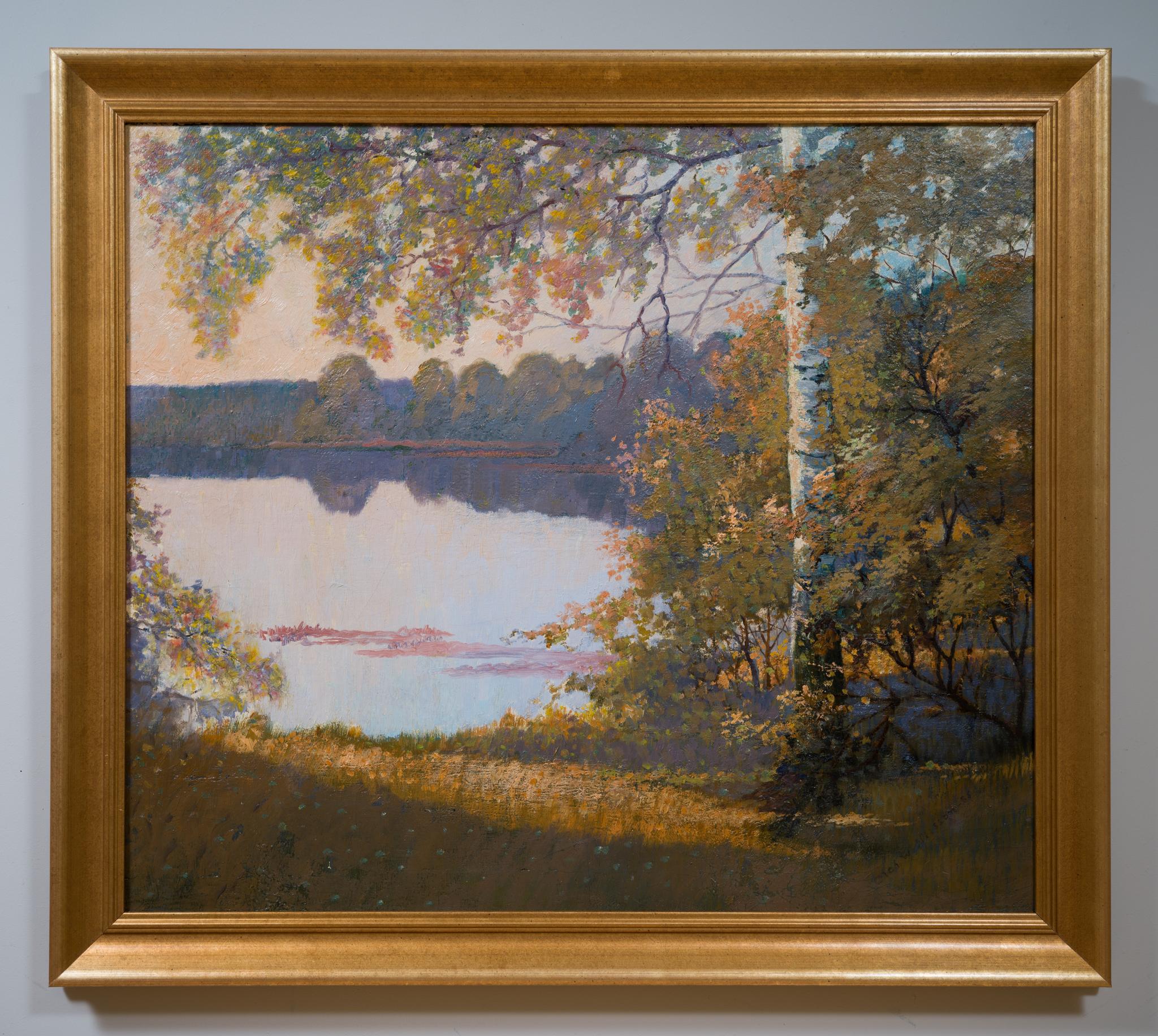 Beneath the golden canopy of a birch tree, this evocative 1935 landscape captures the quiet majesty of autumn by a Swedish lake. The mirror-still water reflects the vibrant foliage in tones of gold, amber, and deep green, creating a near-perfect