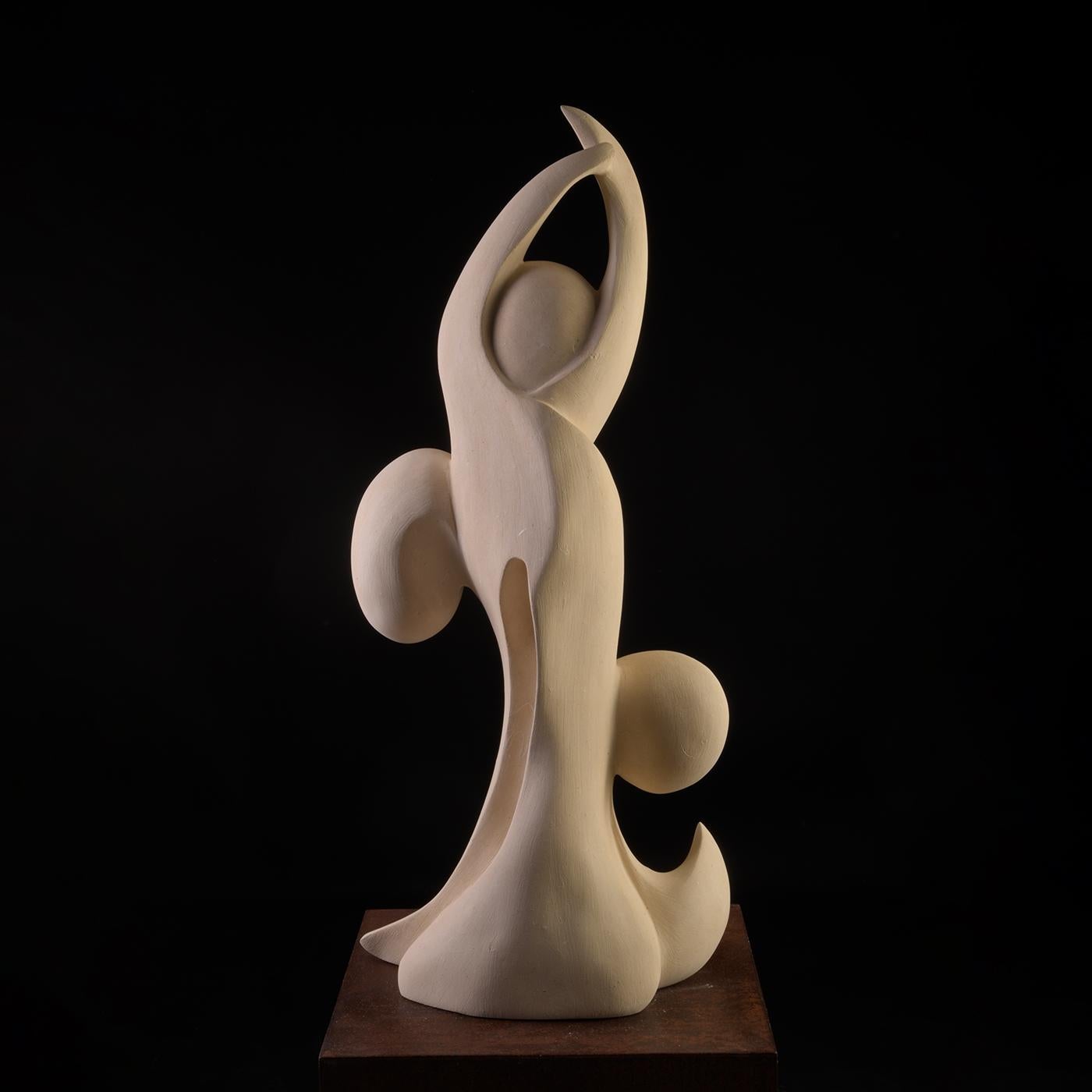 Oltre le Maree sculpture captures the dynamic relationship between humans and the sea, symbolizing life's cycles through fluid, wave-inspired forms. Carved from a unique marine-origin stone rich in ancient fossils, this piece reveals intricate
