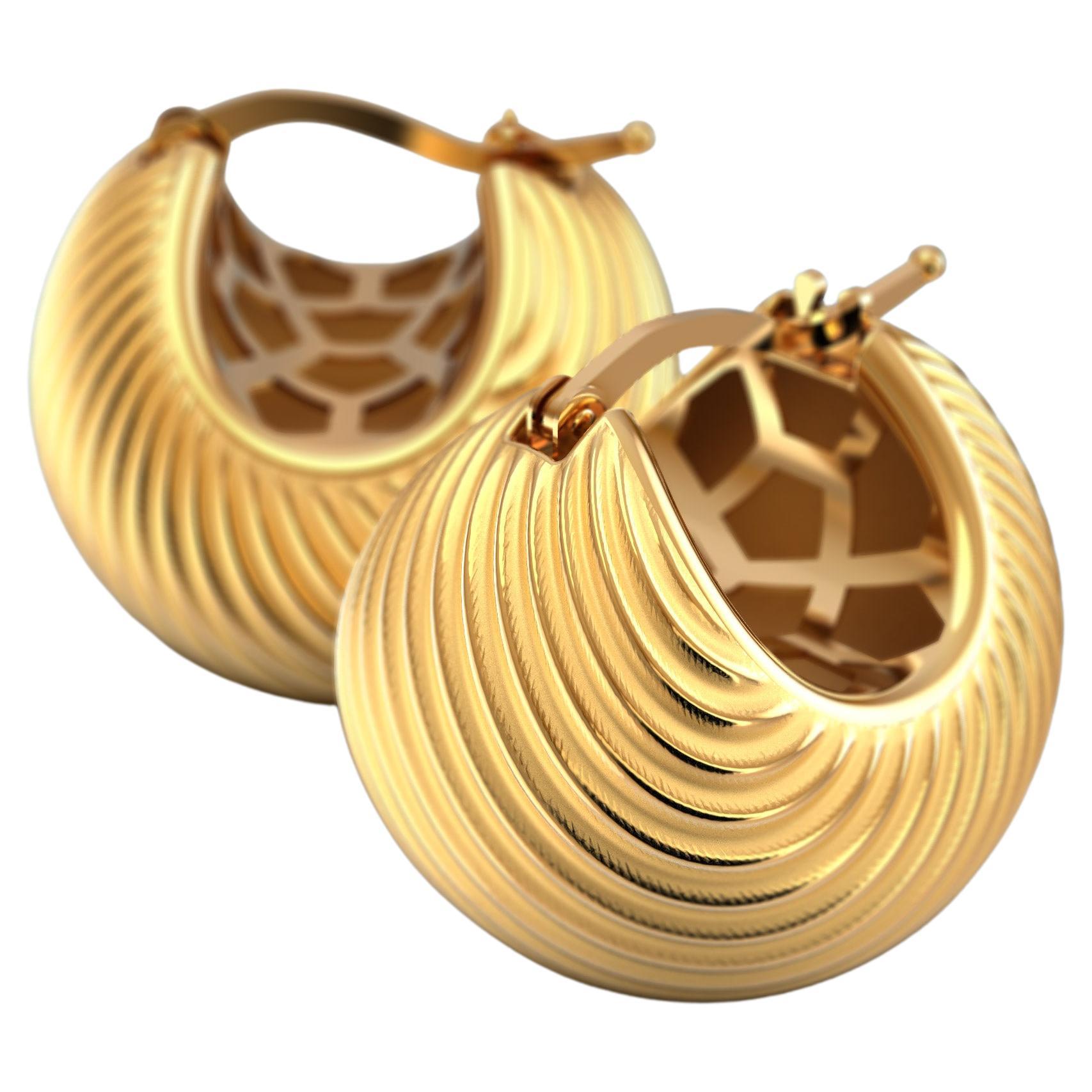 Classic hoop earrings with a ribbed texture, crafted in polished and raw gold 14k 
The hoops are secured by a trusty snap closure.
The approximate total weight is 12 grams in 18k a little less in 14K
Our jewelry is exclusively made to order, can