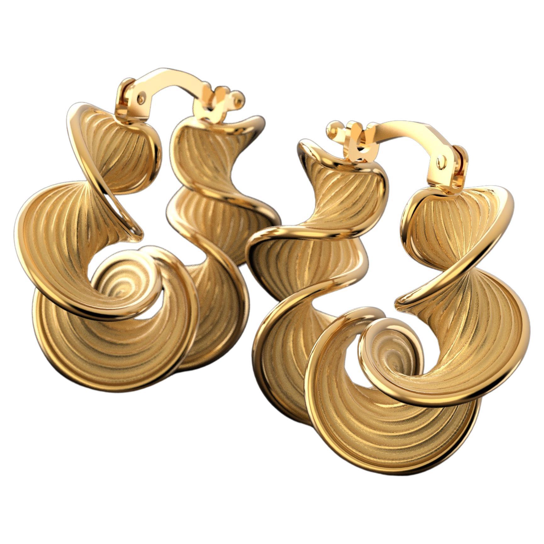 Made to order Twisted hoop earrings, designed and crafted in Italy.
The Eleganza collection is inspired by the voluptuous shapes and sinuous movements of the precious fabrics worn in fashion shows.
The Eleganza twisted hoop earring looks like a