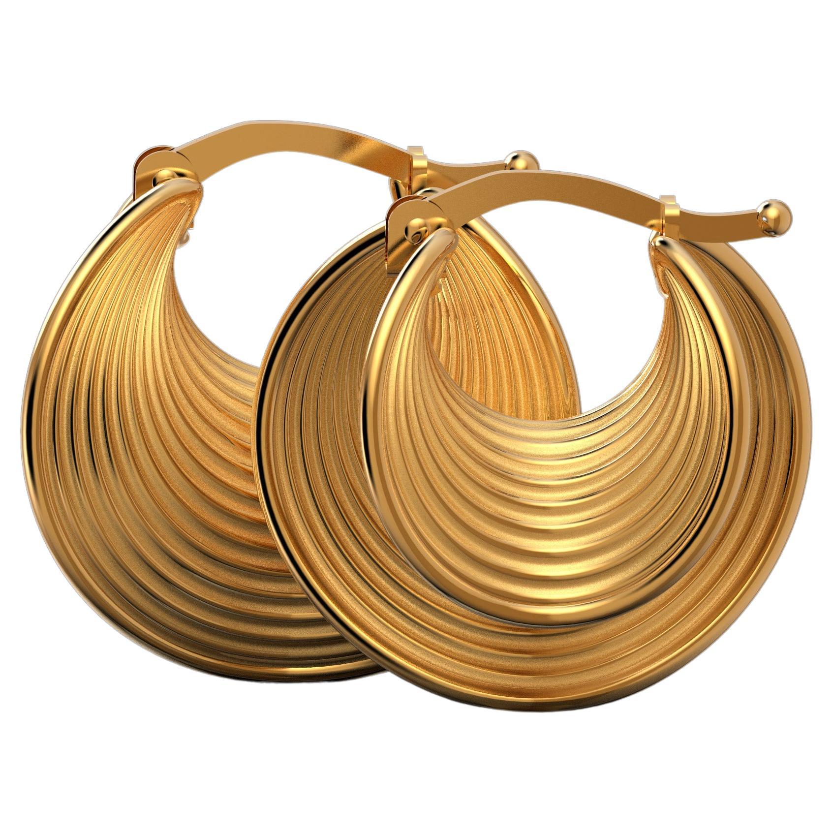 Elegant, modern in their innovative shape but classic at the same time.
18 mm diameter beautiful hoop earrings crafted in polished and raw solid gold 18k.
The production time of this jewel varies from 4-6 working weeks.
The earrings are secured by a