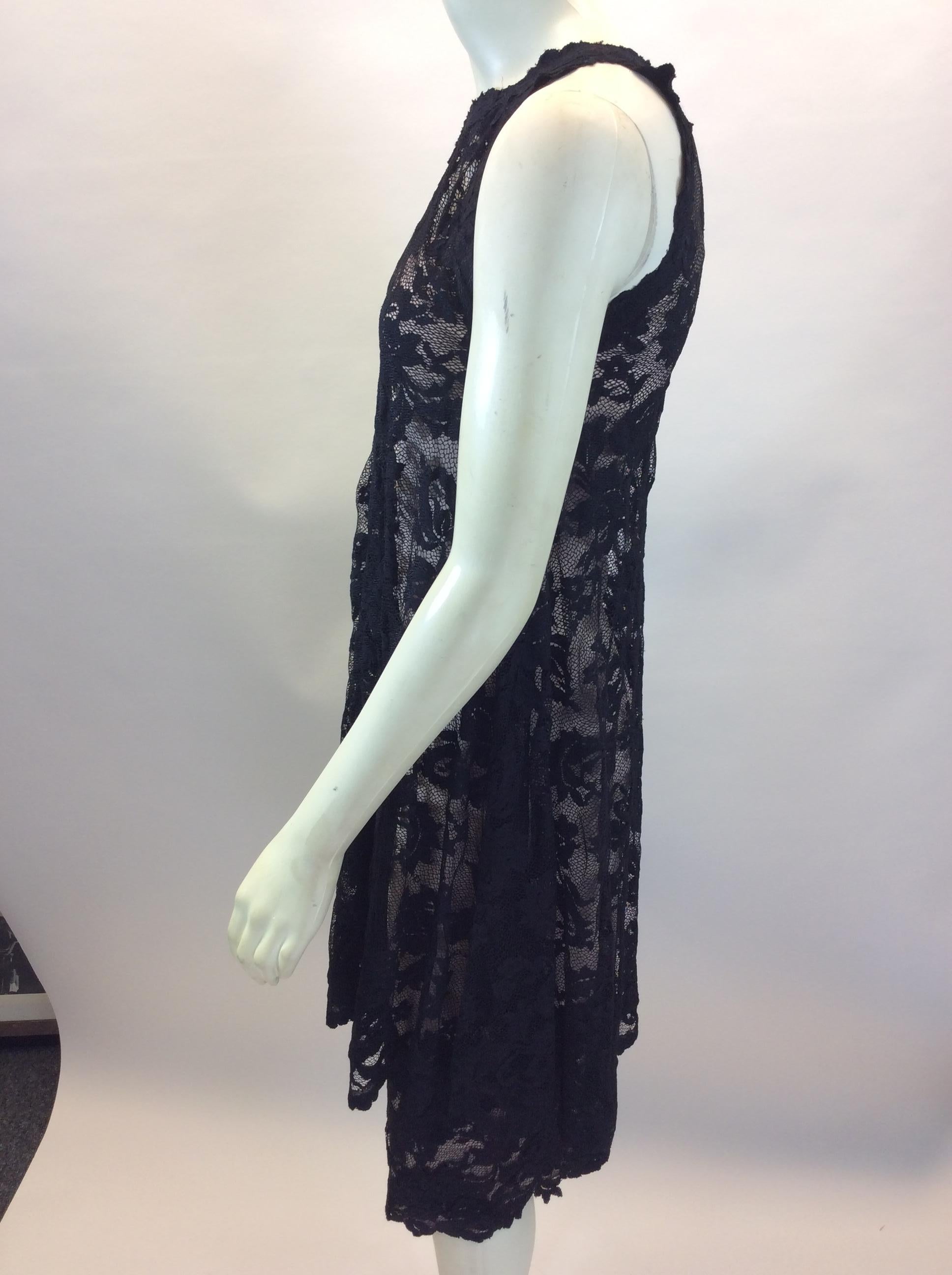 Olvi's Black Lace Dress
$299
Made in Ukraine
59% Polyamide, 29% Viscose, 12% Elastane
Size 1
Length 40