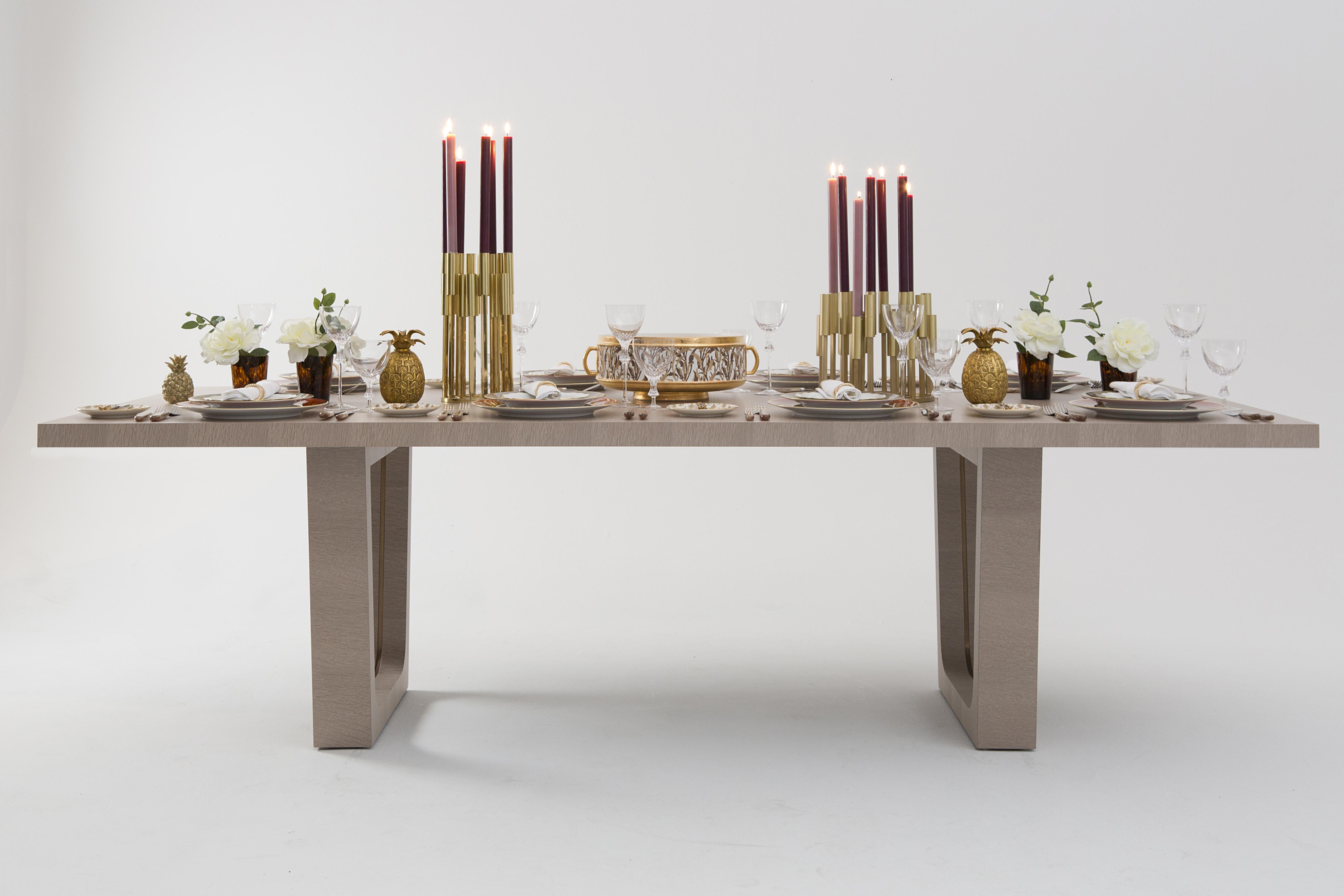 A chic and contemporary dining table finished in matte pale tinted open grain oak with antiqued brushed brass detailing.

This new design celebrates an exciting new direction for Davidson boasting an open grain to add to their growing range of