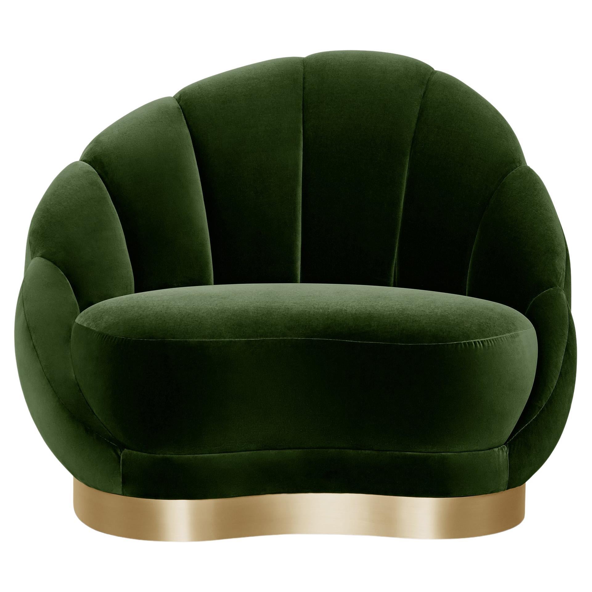 Sillón Olympia by Munna
Dimensiones: P 100 x An 110 x Al 91 cm. SH: 42 cm.
Materiales: Madera, espuma y tapicería.
Acabado: Terciopelo de algodón y latón cepillado.

Disponible en todos los tejidos Munna excepto en Seda salvaje. Disponible en