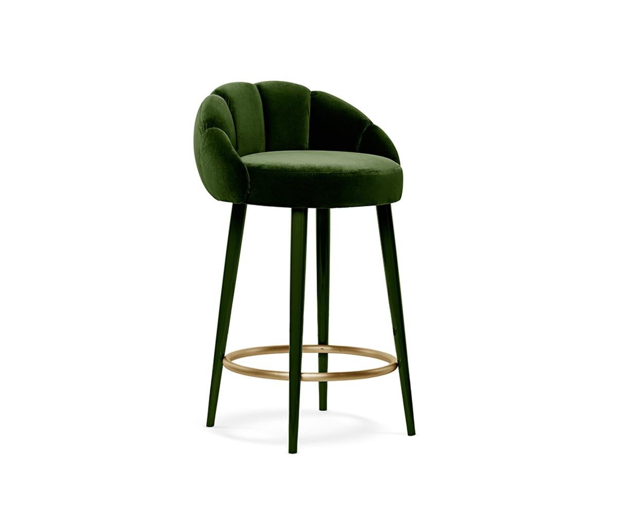 Olympia Counter Stool by Munna
Dimensions: D 55 x W 58 x H 90 cm. SH: 70 cm.
Materials: Solid wood, foam, brass, and upholstery.
Finish: Upholstery: Cotton Velvet, ref. Emerald, CV09. Ring: Brushed brass. Legs: Emerald gloss lacquer.

Available in