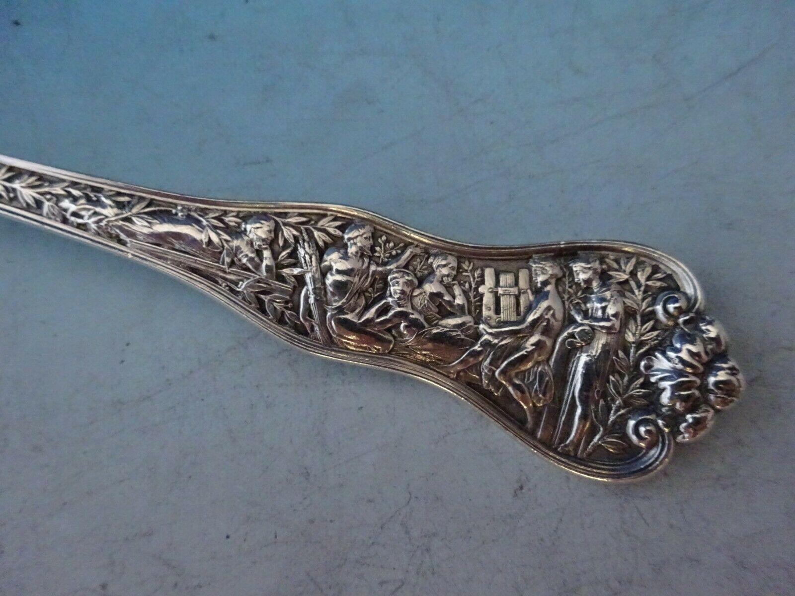 Sterling silver preserve spoon scalloped 7