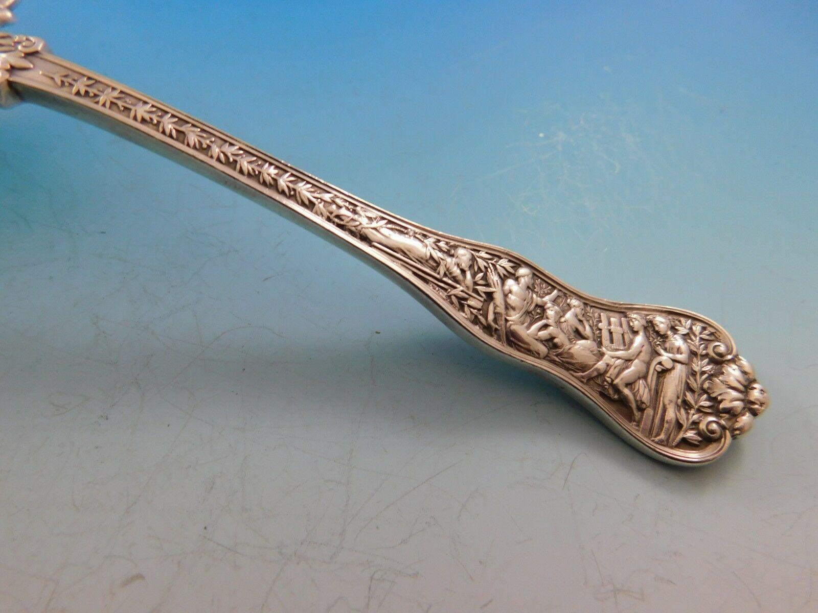 Stunning sterling silver Saratoga chip server in the pattern Olympian by Tiffany and Co. The handle of this piece features the fifth motif in this pattern, which is Orpheus, in search of his wife Eurydice, charming all those around him with the