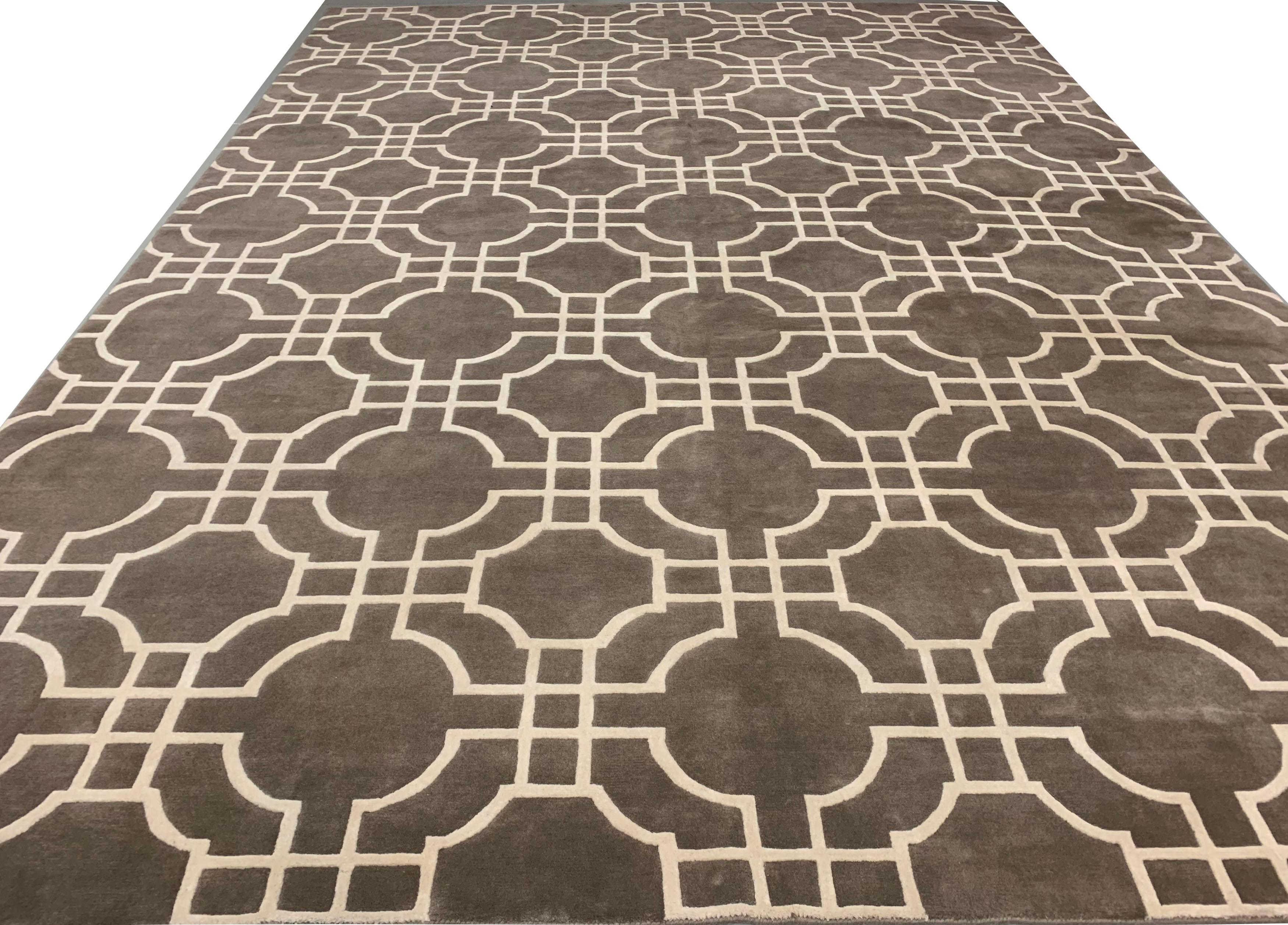 Olympic Collection Taupe cream rug 9' x 12'. A contemporary style hand knotted using a combination of wool and viscose that adds a soft silky sheen to the overall look.