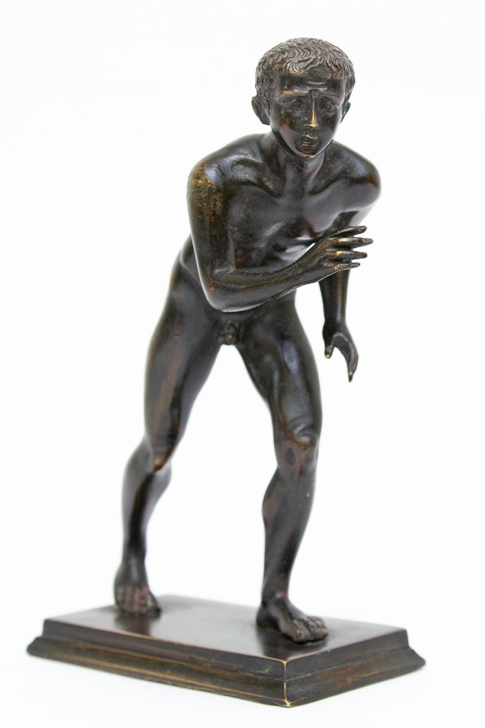 Antique bronze sculpture. The Herculaneum runner. After the antique model in the Villa of the Papyri, Herculaneum, now located in Neaples Royal Museum.