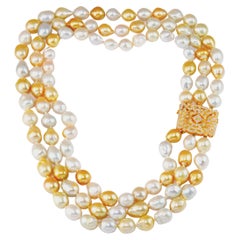 Olympus Art Certified, Collana barocca con perle dei mari del sud e nuovi inizi