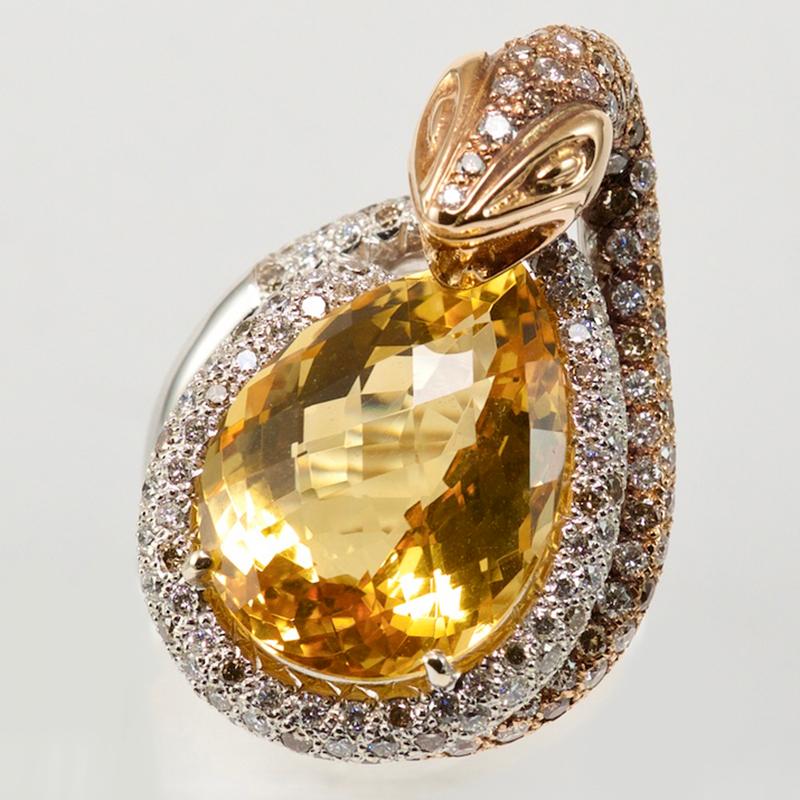 18 Carat 750 White & Pink Gold
2.37 Carat Diamond Round Cut
1.08 Carat Diamond Round Cut Brown
21.02 Carat Yellow Topaz 
Olympus Art Cretified 
Power of The Snake Ring

The snake animal meaning is powerfully connected to life force and primal