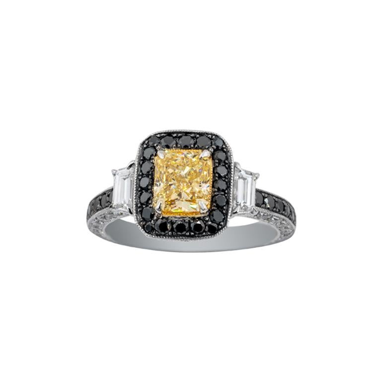 Olympus Art Certified, 18 carat White Gold, 
1.23 Carat Fancy Light Yellow Diamond, 
0.33 Carat Baguette Diamond G/H VS, 
0.62 Carat Black Diamond, 
0.55 Carat Diamond G/H VS
All Skin Colors Unique Art Ring