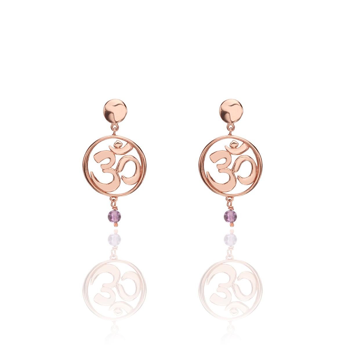 Unique pair of drop earrings inspired by Yoga Symbol OM handcrafted in 14Kt gold.
Om is the sound of universe and one of the most important spiritual symbols. Om symbolizes the past, the present and the future, however it has a different meaning for