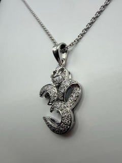 OM diamond pendant necklace 18KT white gold