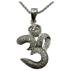 OM diamond pendant necklace 18KT white gold