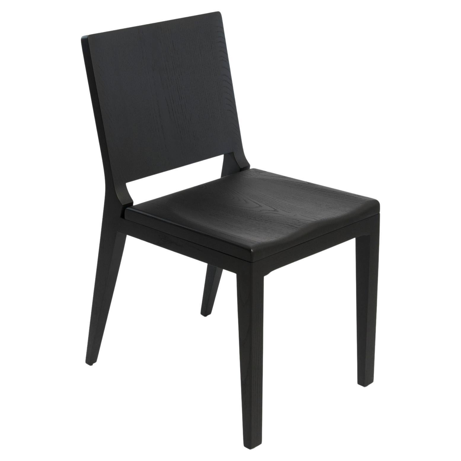 Chaise minimaliste en frêne noir om5.0 par mjiila