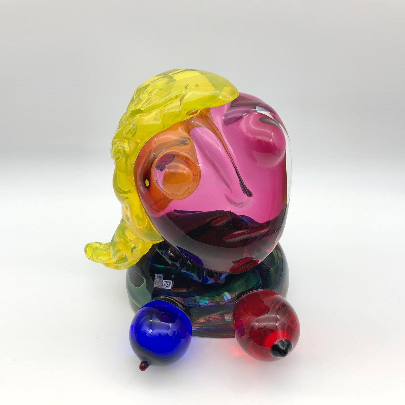 A tribute to visionary Spanish artist Pablo Picasso by master glassmaker Toso Cristiano, this stunning sculpture exudes a colorful charm of Cubist inspiration. Entirely handcrafted of solid glass, it depicts a female figure with blonde hair and a