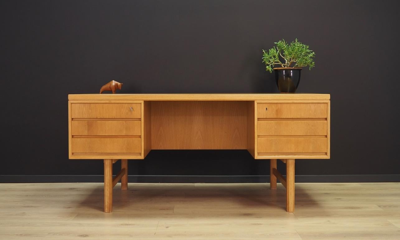 Fantastic desk from the 1960-1970s. Scandinavian design, Minimalist form. Model 76 manufactured by Omann Jun. Furniture finished with ash veneer. The desk has six drawers and a bar, keys included in the set. Maintained in good condition (minor