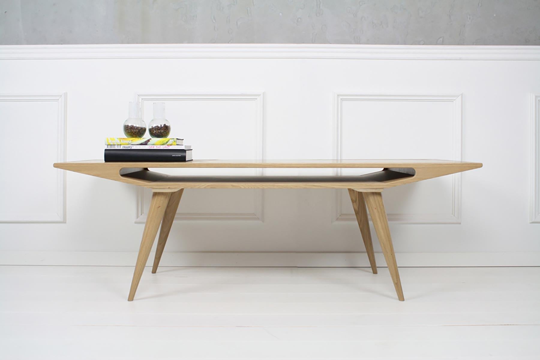 Originally produced between 1953-1970, Omann Jun’s Model 100 coffee table was relaunched in 2016 for a new generation of design enthusiasts to enjoy.

Crafted in oak, the Model 100 offers crisp, angular lines that will fit perfectly in any modern