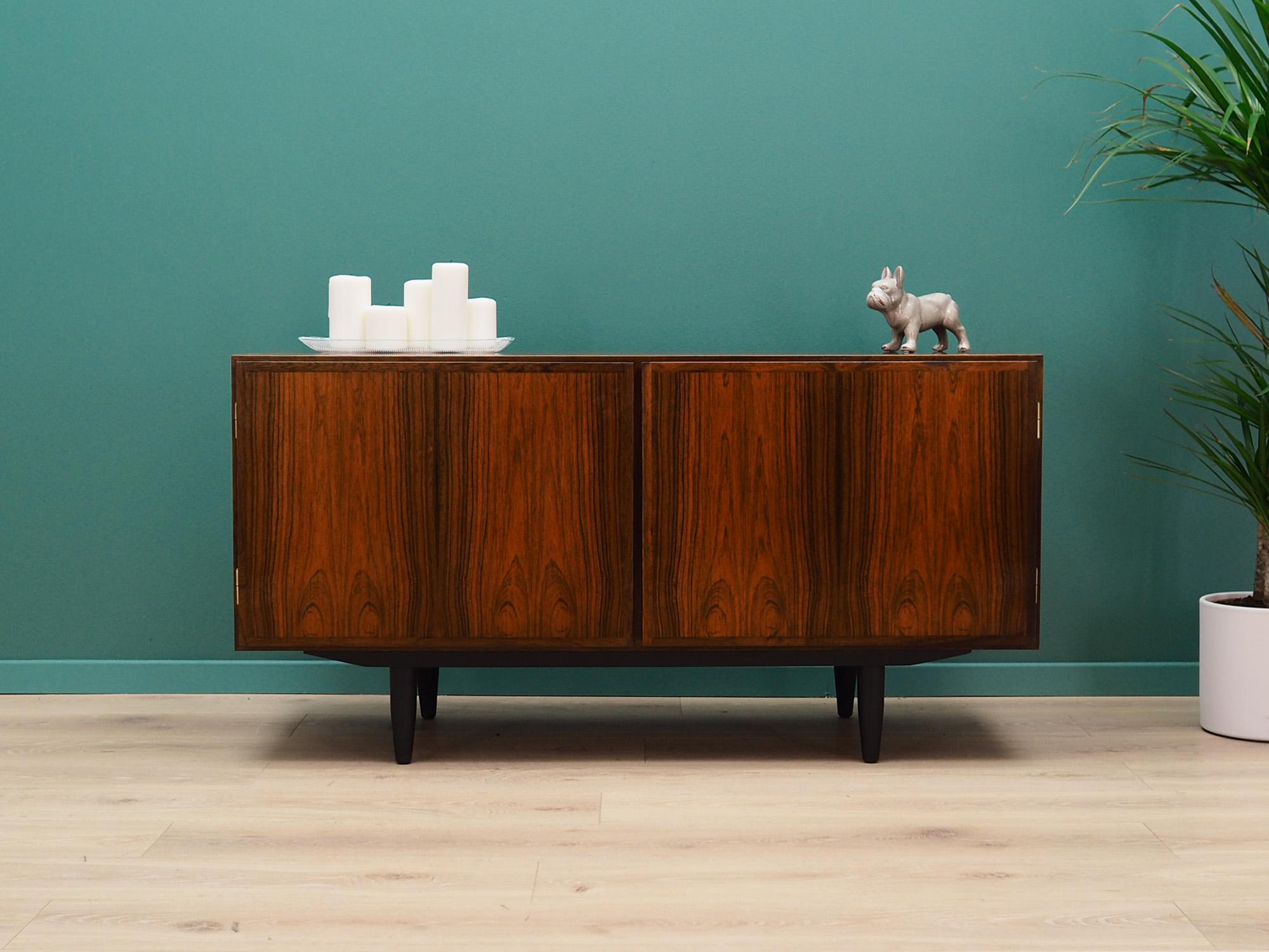 Brilliant cabinet from the 1960s-1970s. Danish design, Minimalist form. Cult model no. 1 produced by Omann Jun. The furniture is finished with rosewood veneer. Shelf and drawer in the interior. Preserved in good condition (small bruises and