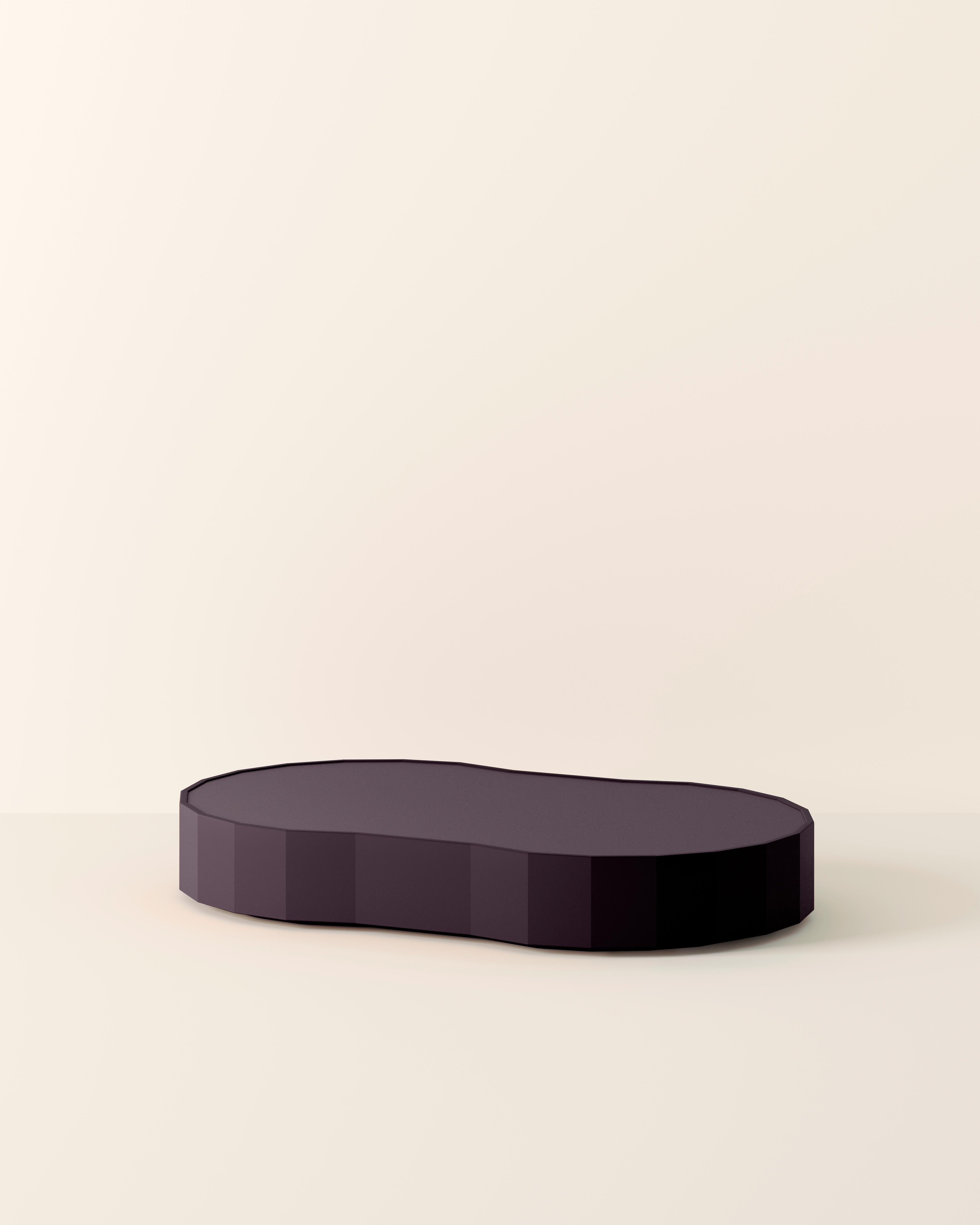 Ombra low table deep matt, designed by Samuel Dos Santos and produced in Italy, combines geometric design with rigorous shapes and elegant curves, transforming this furniture into a unique sculptural piece. 
The extra matte finish accentuates its