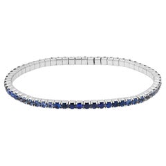 Bracciale tennis elasticizzato con zaffiri blu ombré