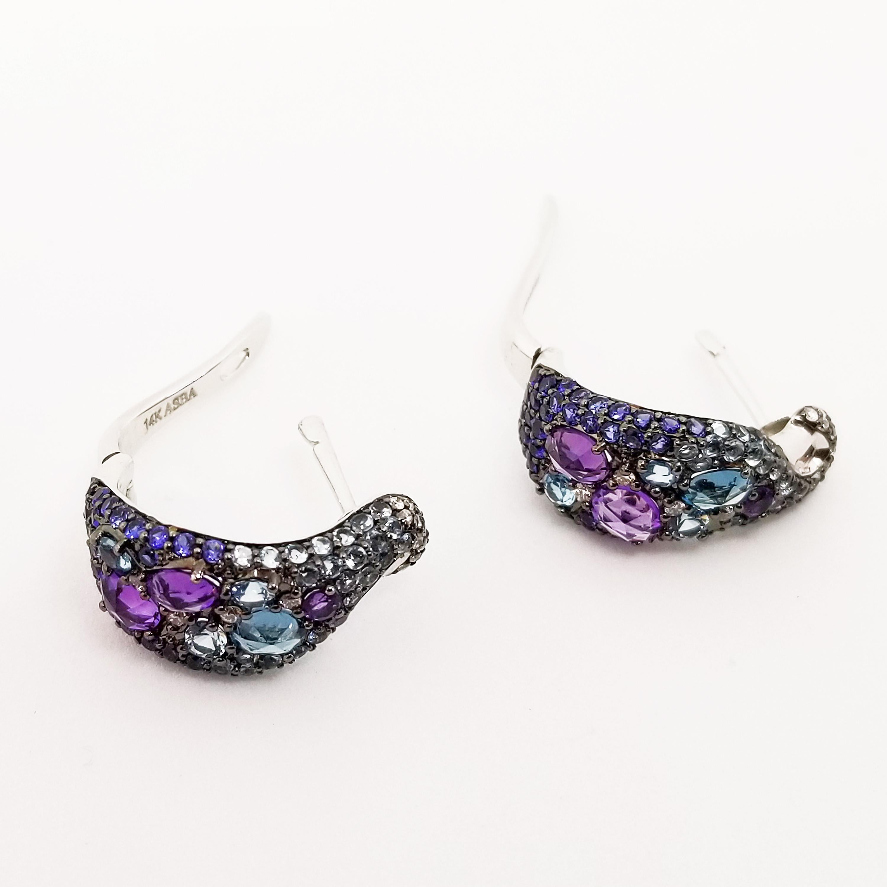 One pair of Post and Lever Back Gemstone Encrusted Hoops featuring faceted, Brilliant and Rose Cut Stones. The uniquely curved Earrings are set with an Ombre of Colors from Purple to Blue and White to Champagne. Pave set in the Earrings are 0.15