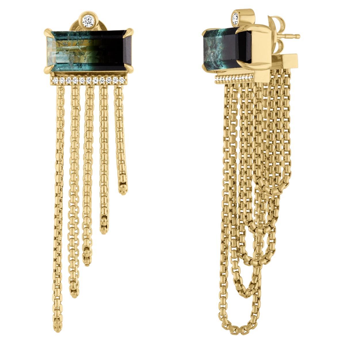 Aqua to deepest, darkest green-almost black banded tourmalines are set with edgy claw prongs, sitting atop looped lengths of round box chain, all in 18K yellow gold. This front to back design distributes the weight of the earring evenly and
