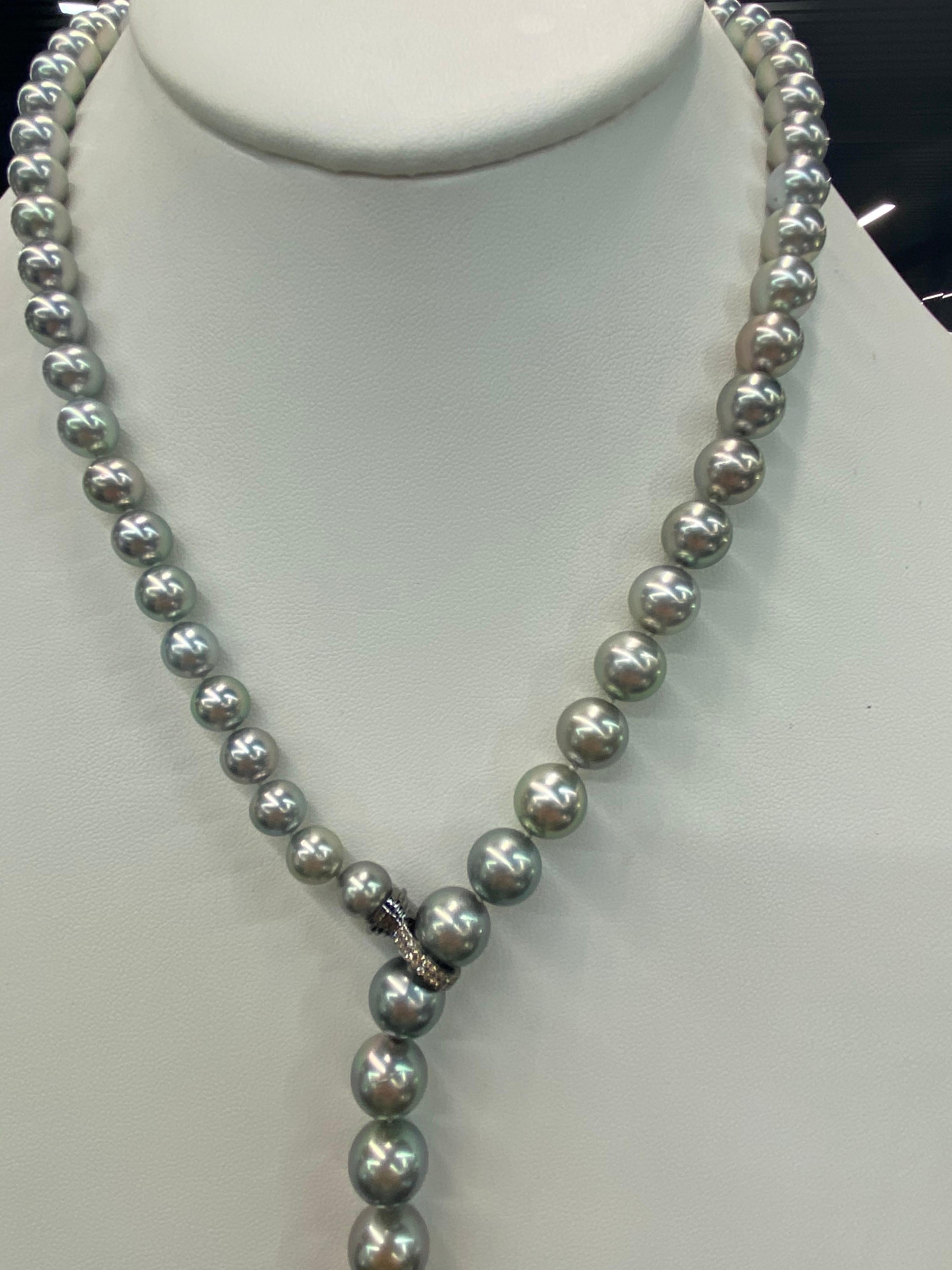 Chic Ombre Tahitian Pearl necklace featuring 65 pearls measuring 8-13.9 mm and a diamond front clasp. 
Pearl quality: AAA
Pearl Luster: AAA Excellent
Nacre : Very Thick

Strand can be made to order, shortened or longer. Clasp can be changed, Diamond