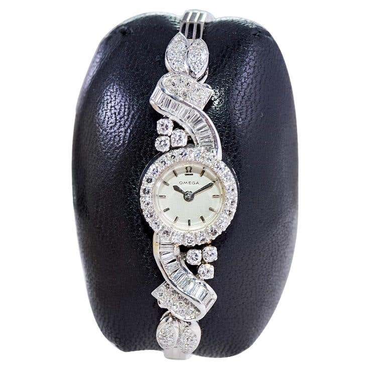 Art Deco Style 1950s Swiss Ruby and Diamond Yellow Gold Omega Watch For ...