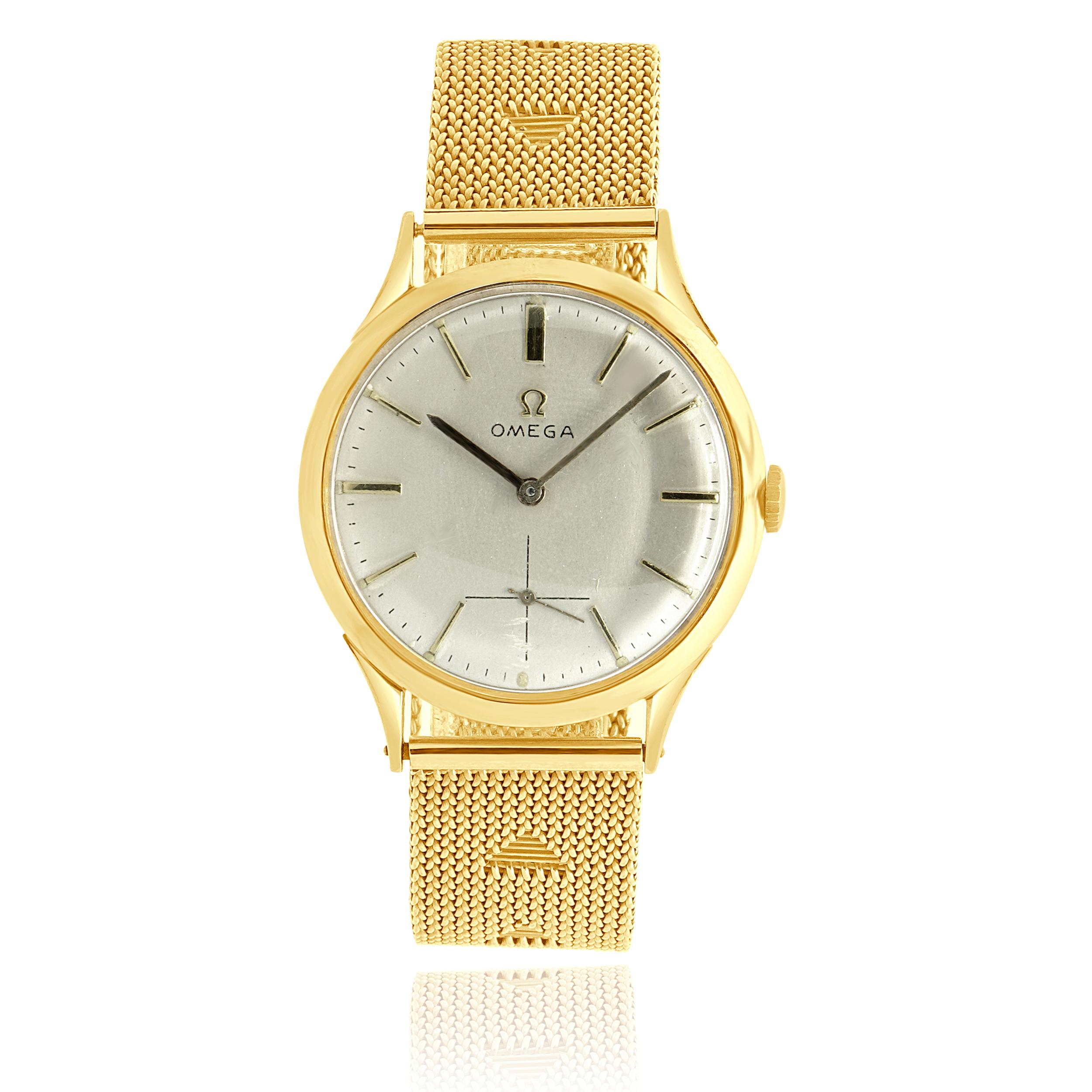 Marque : Omega
Mouvement : vent manuel
Fonction : heures, minutes, secondes
Boîtier : Boîtier rond en or jaune 18 carats de 34 mm, lunette lisse
Bracelet : bracelet en maille d'or jaune 18k
Cadran : bâton de champagne
Numéro de référence