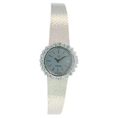 Reloj Omega de oro blanco de 18 quilates y bisel de diamantes de 1 quilate con malla para mujer