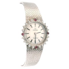 Reloj mecánico Omega de señora con bisel de diamantes y malla de oro blanco de 18 quilates