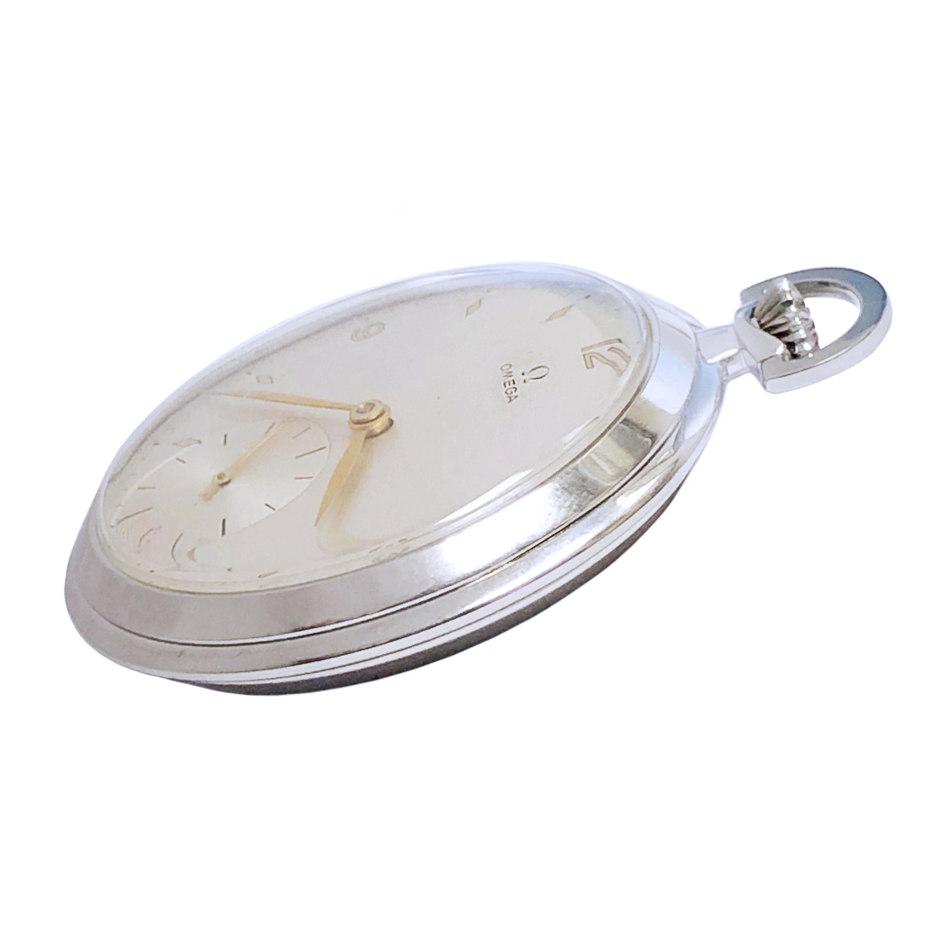 Circa 1930s Omega Gents Pocket Watch, 48 MM 3 piece Stainless Steel Art Deco signed Omega case, 17 Jewel Mechanical, Manual wind Nickle Lever movement,  original Silver Satin dial with Gold Mirrored markers and Gold hands. Recently serviced and