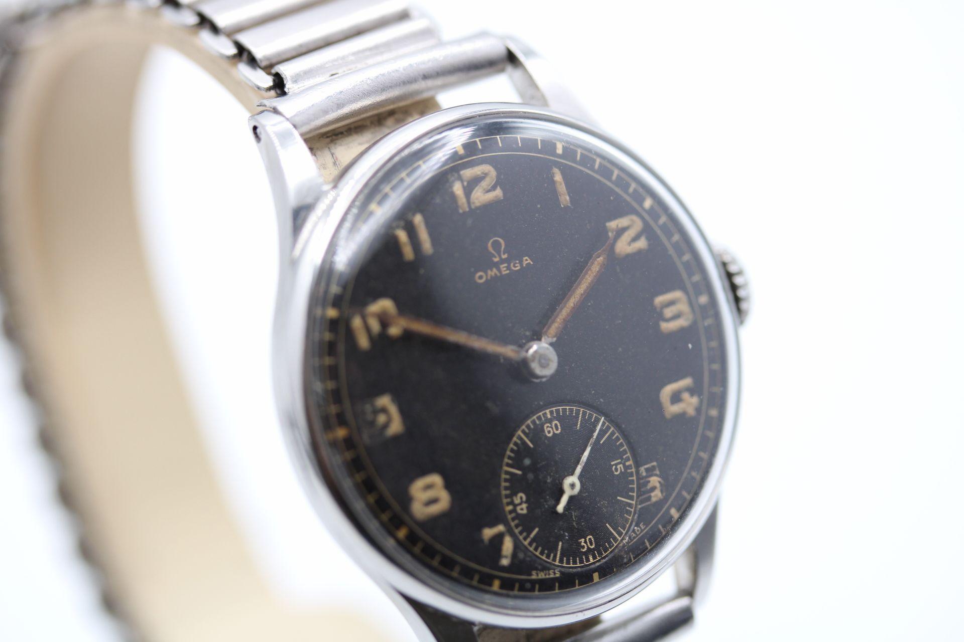 Omega Black Gilt dial from approximately the 1940’s, a really stunning example of an early Omega that has kept its originality with the dial although naturally aged and discoloured in places largely left untouched. Small steel case measuring