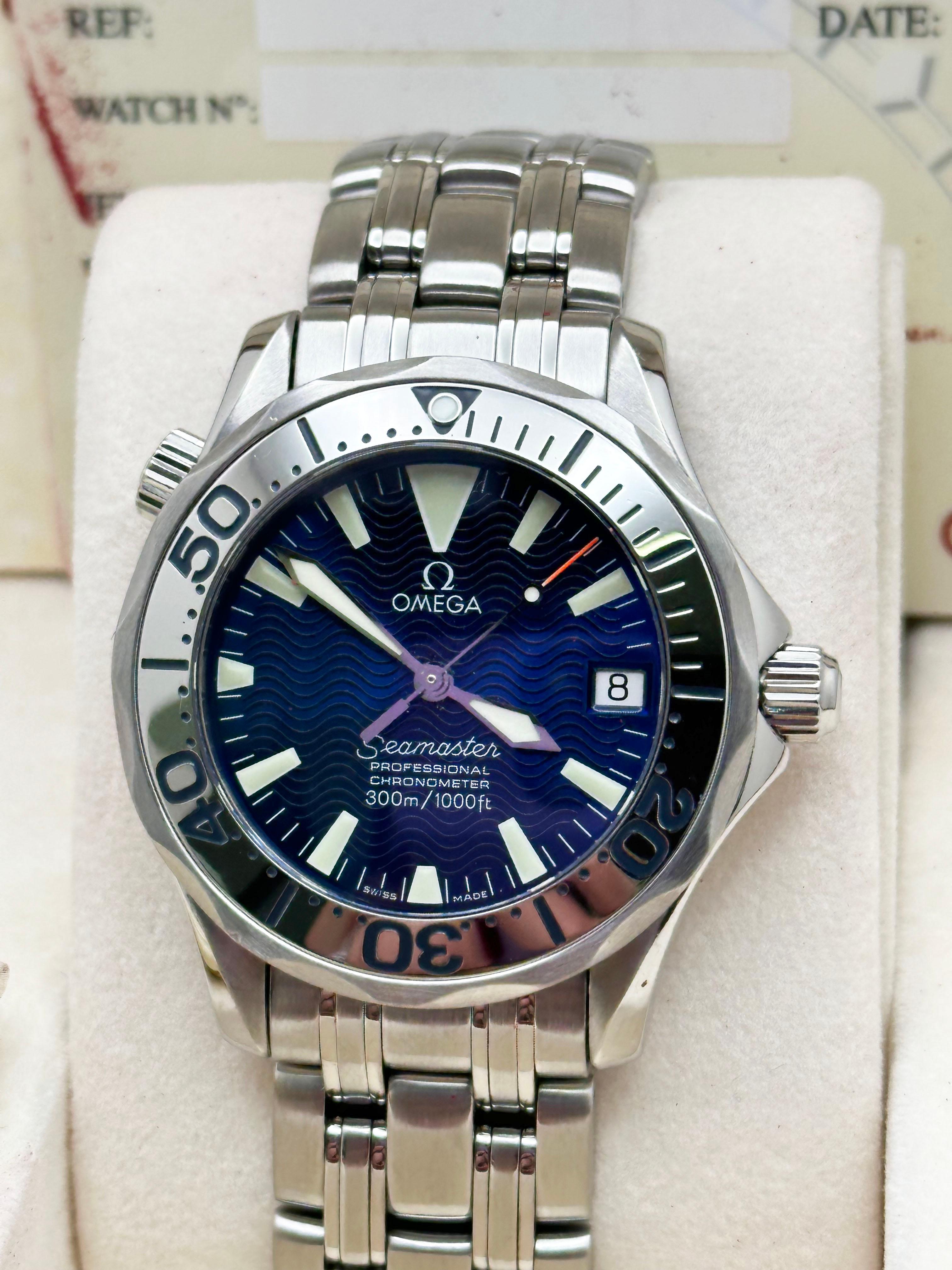 Omega 2053.80.00 Seamaster Blaues Zifferblatt Edelstahl-Kastenpapier mit blauem Zifferblatt für Damen oder Herren