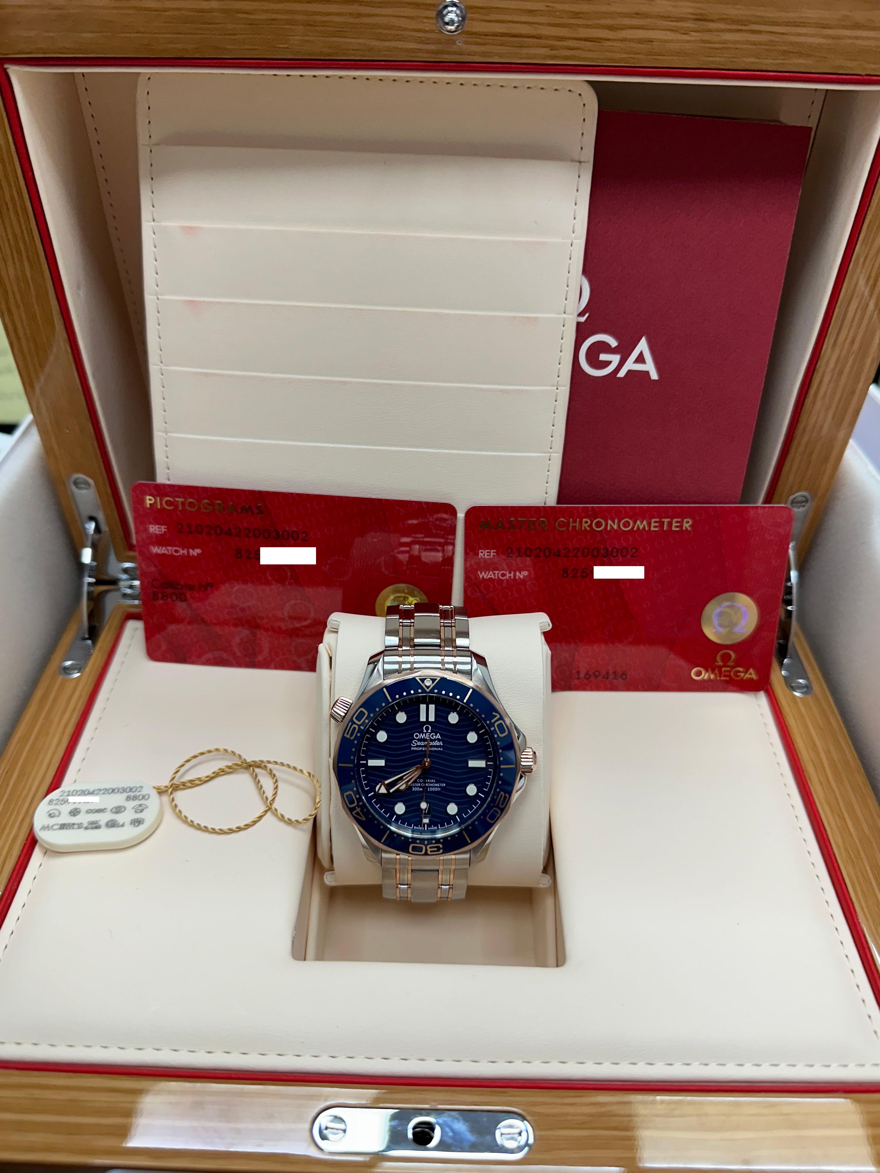 Style Number: 210.20.42.20.03.002

 

Model: Seamaster Diver

 

Case Material: Stainless Steel 

 

Band: 18K Rose Gold & Stainless Steel 

 

Bezel:  Blue Ceramic 

 

Dial: Blue Dial 

 

Face: Sapphire Crystal 

 

Case Size: 42mm 

 

Includes:
