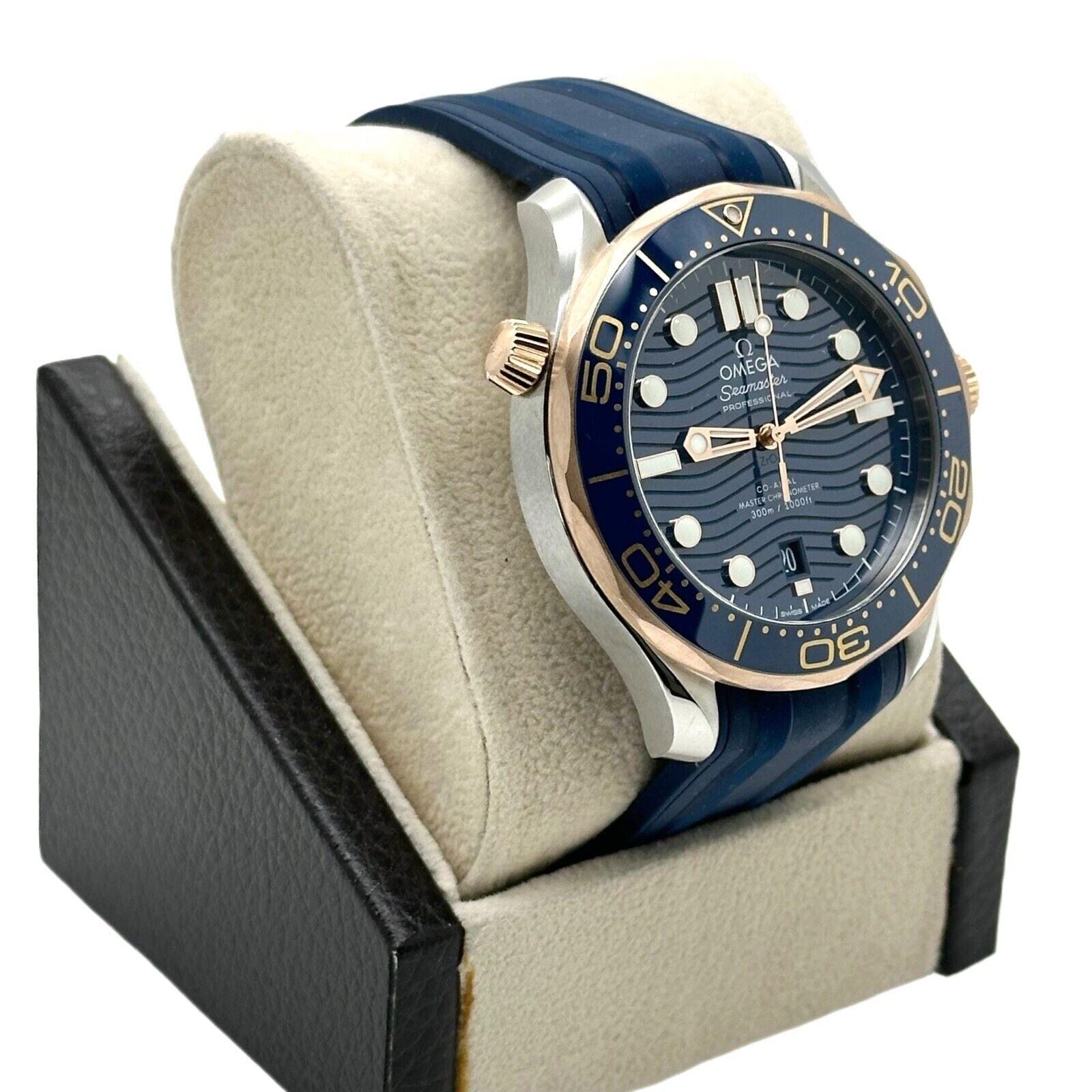 Style Number: 210.22.42.20.03.002

 

Model: Seamster 

 

Case Material: Stainless Steel  

 

Band: Blue Rubber 

 

Bezel: 18K Rose Gold Blue Insert  

 

Dial: Blue

 

Face: Sapphire Crystal 

 

Case Size: 42mm

 

Includes: 

-Omega Box &