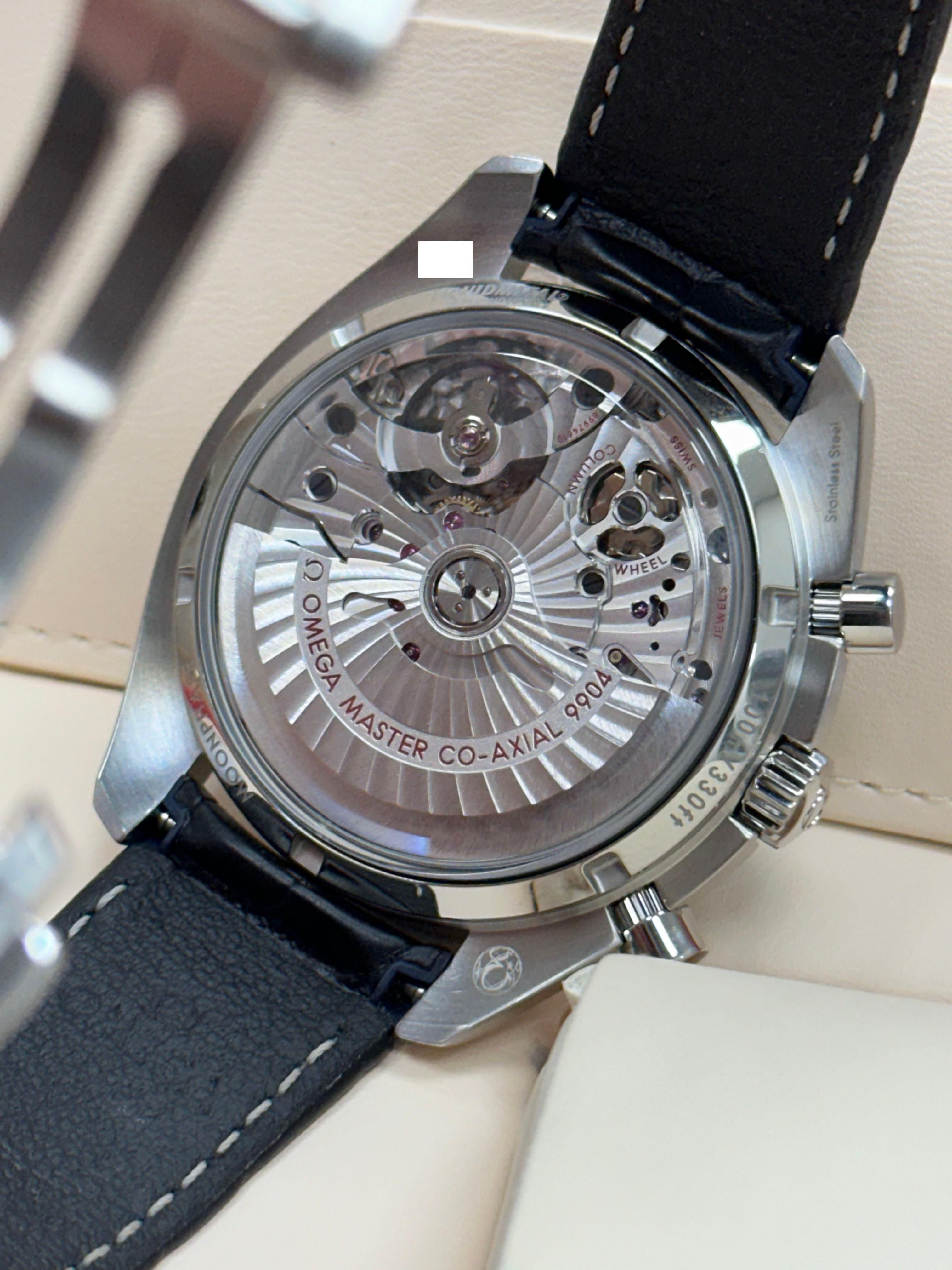 Omega 304.33.44,52.03,001 Speedmaster Moonphase Blaues Zifferblatt Edelstahl Box Papier 4